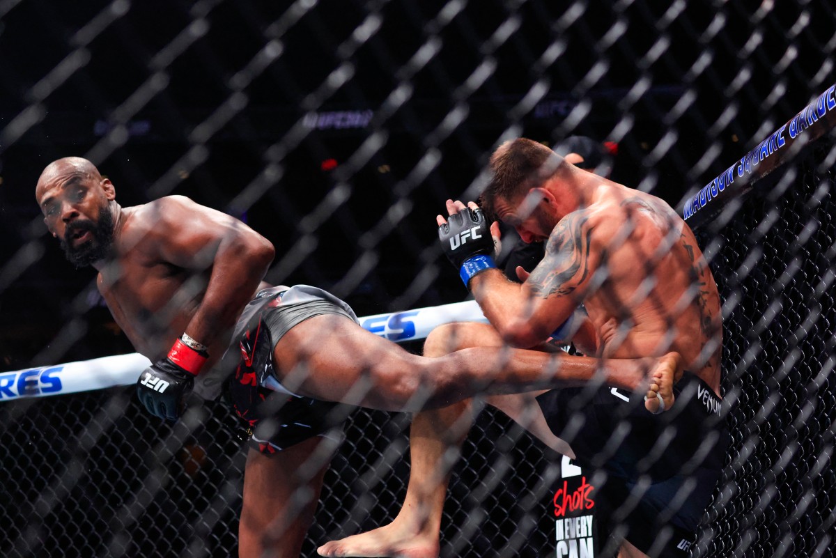 Jon Jones sends Stipe Miocic into retirement in front of Trump