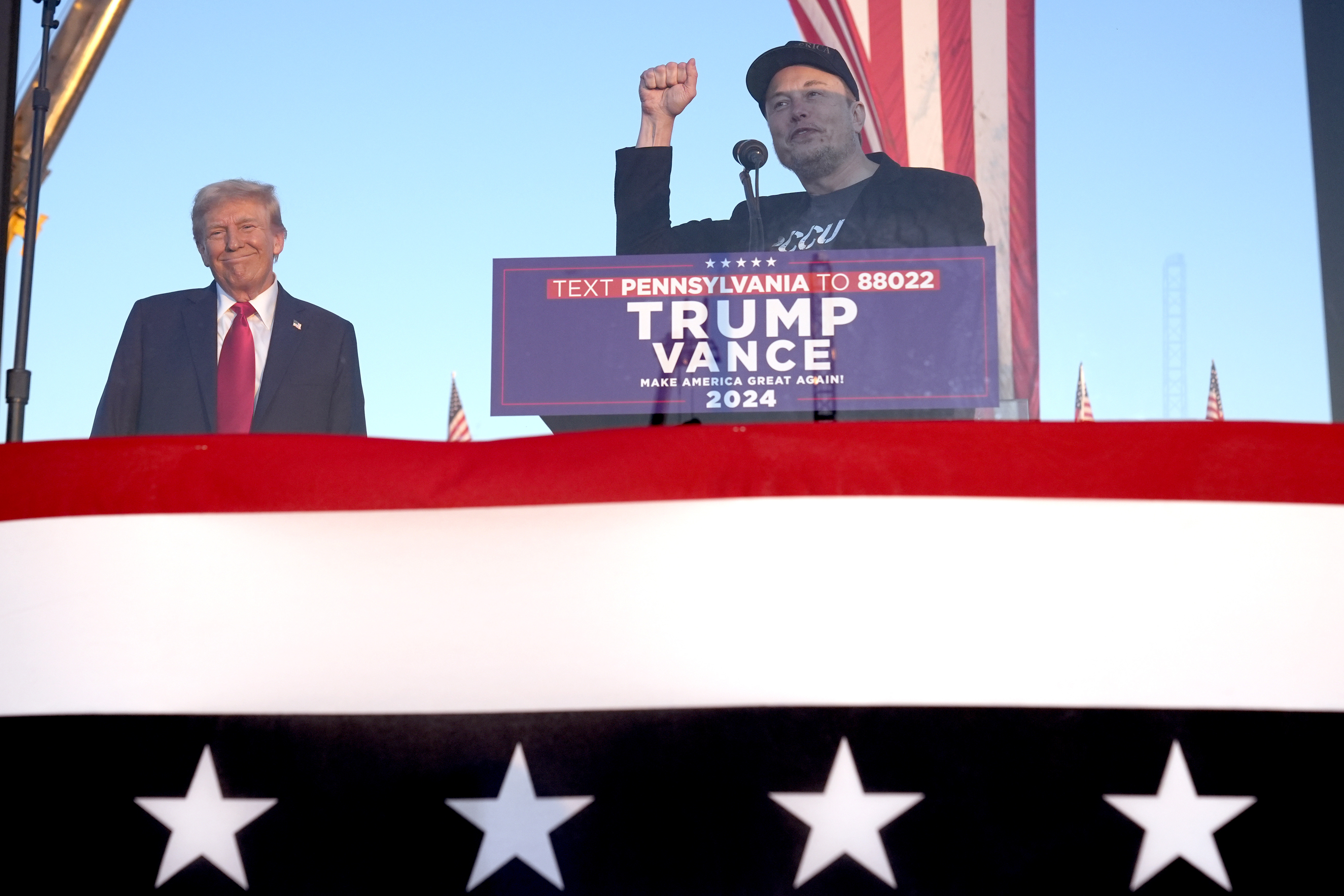 Donald Trump and Elon Musk on stage during 2024 campaign