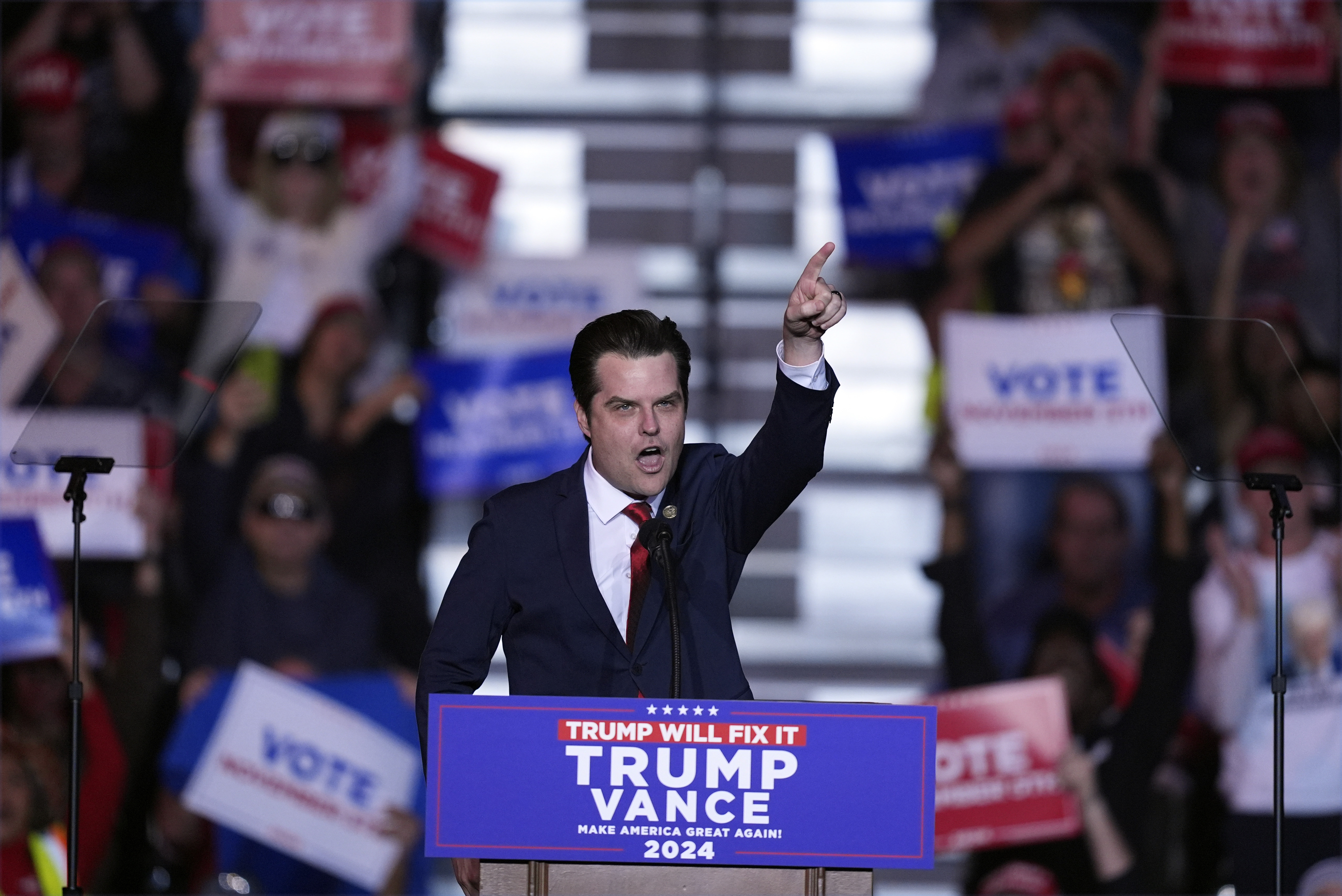 Matt Gaetz gestures at a Trump rally