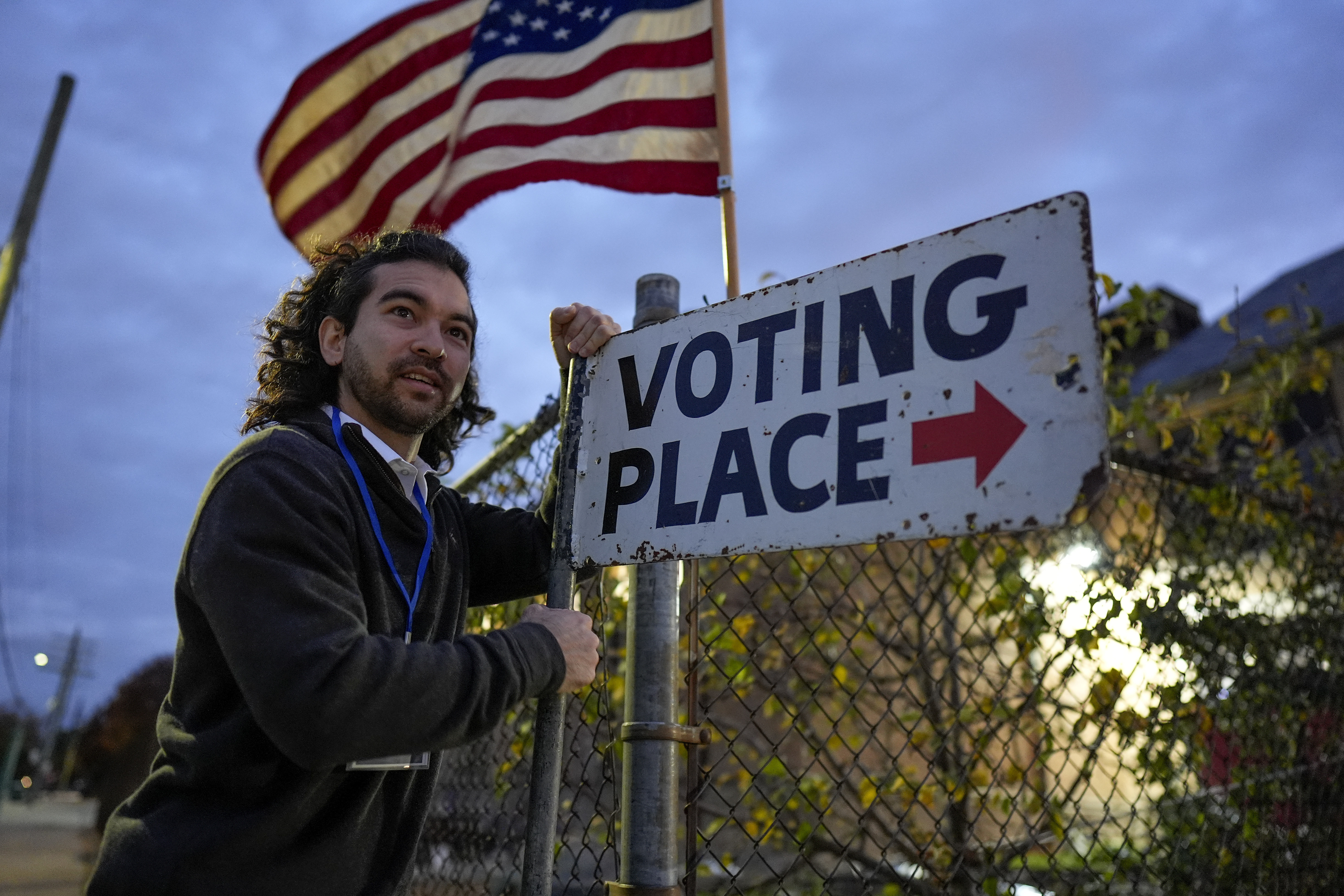Election day worker Sean Vander Waal prepares to open a polling place