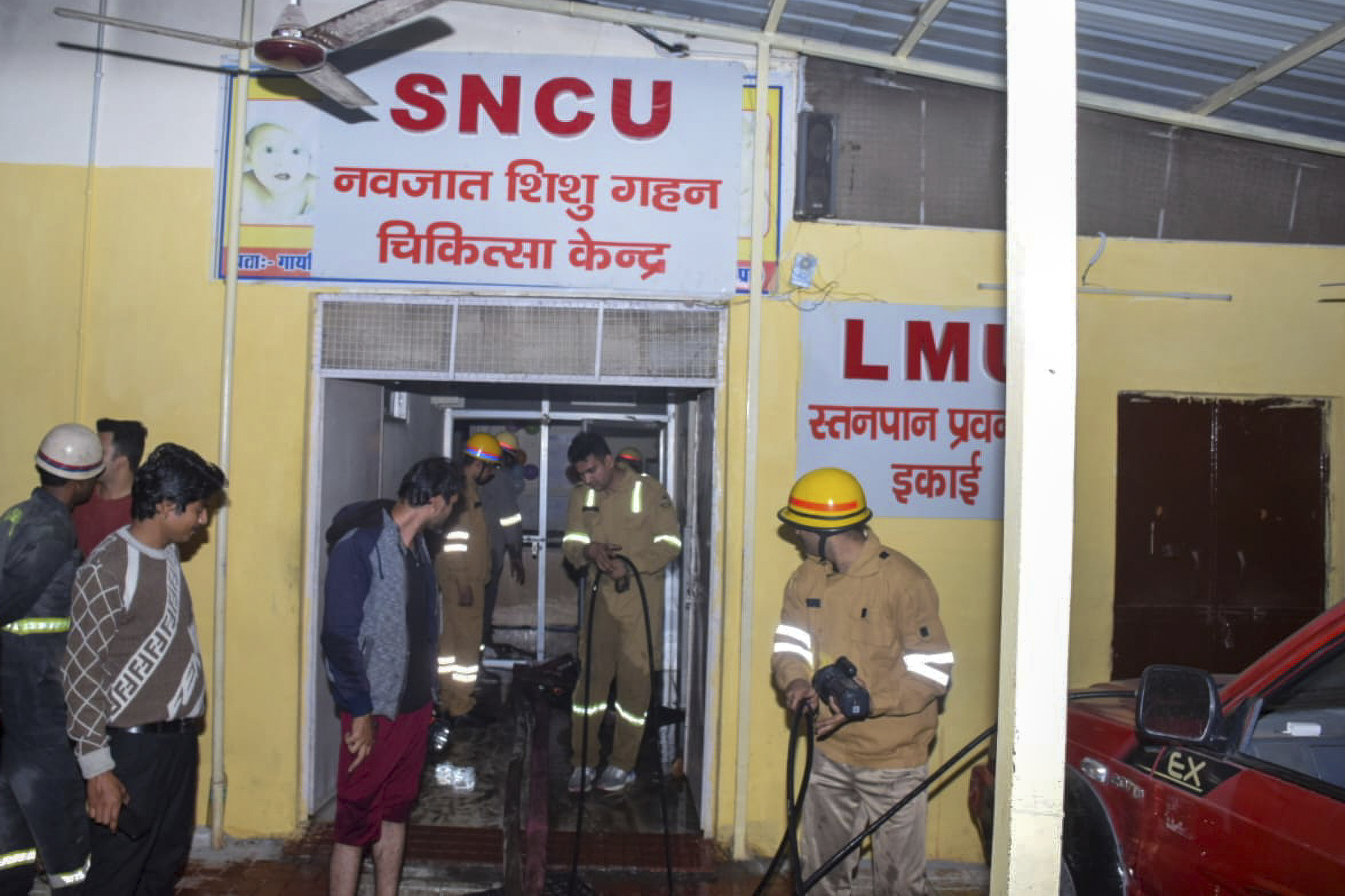 Firefighters in the neonatal intensive care unit at the Jhansi hospital [AP Photo]