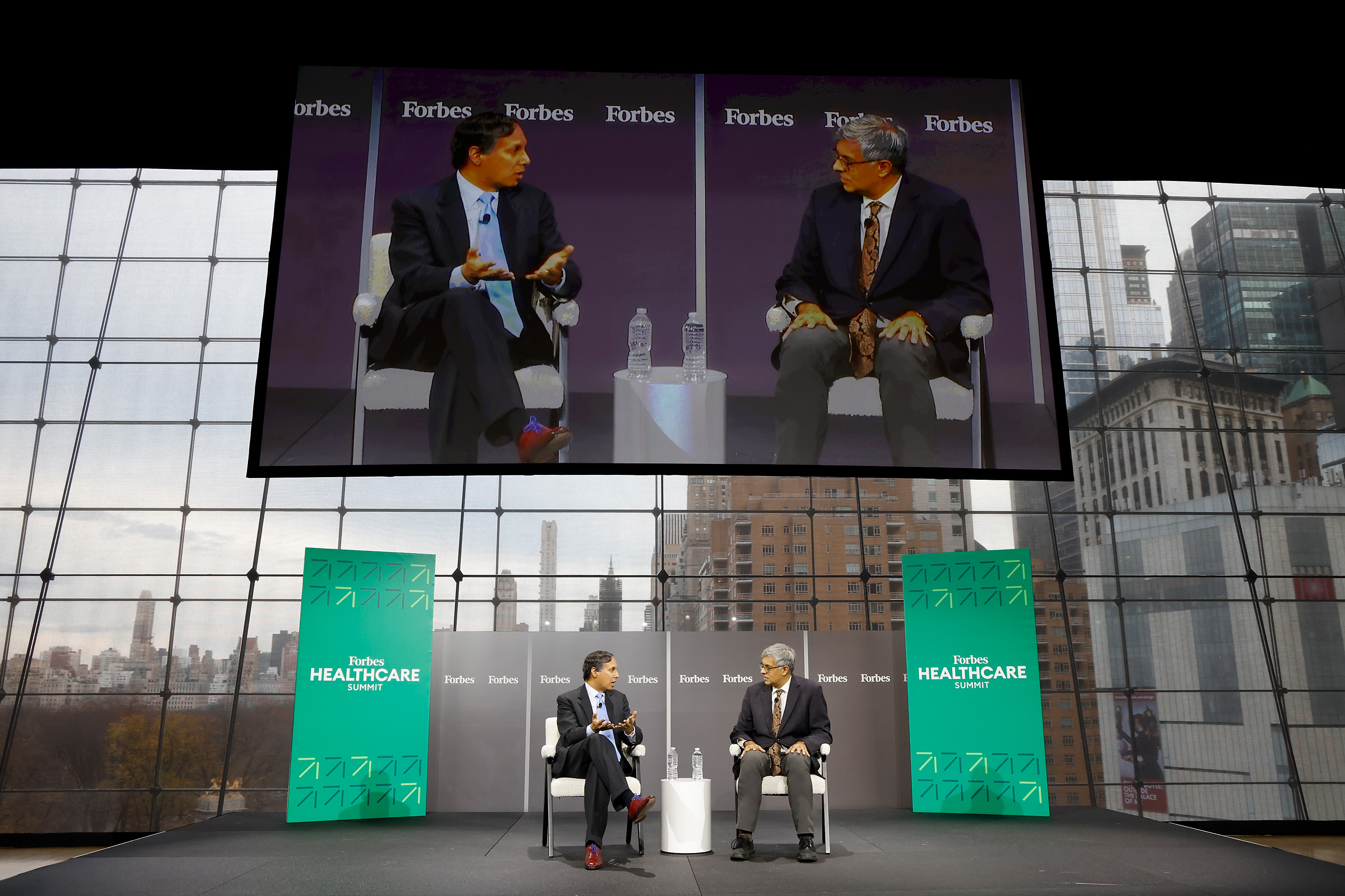 American conservative activist and commentator Avik Roy and Jay Bhattacharya speak during the 2023 Forbes Healthcare Summit at Jazz at Lincoln Center on December 5, 2023, in New York City