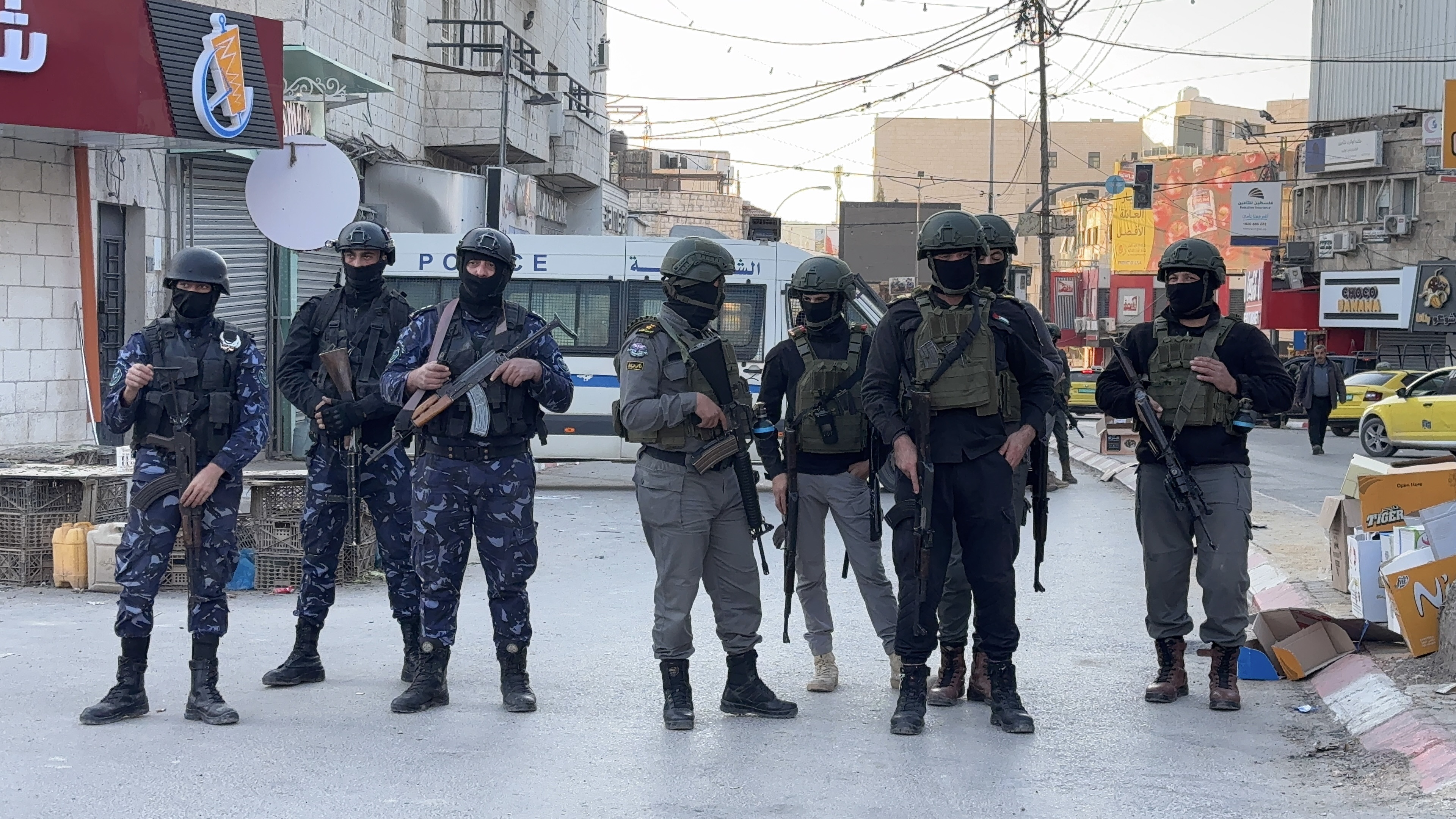 Palestinian security forces in full armoured gear