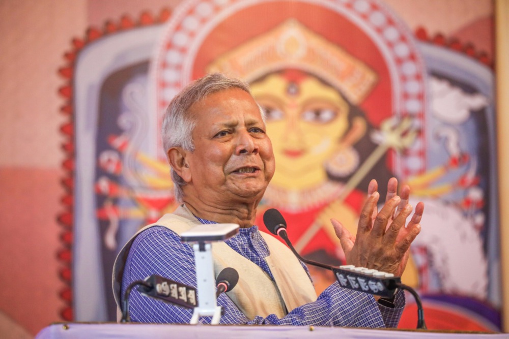epa11656040 Bangladesh Chief Adviser, Professor Dr. Muhammad Yunus addresses Hindu community members during his visit to the Dhakeshwari National Temple in Dhaka, Bangladesh, 12 October 2024. Yunus visited the Dhakeshwari National Temple to exchange greetings with the Hindu community on the occasion of Durga Puja, the largest Hindu religious festival in Bangladesh. EPA-EFE/MONIRUL ALAM