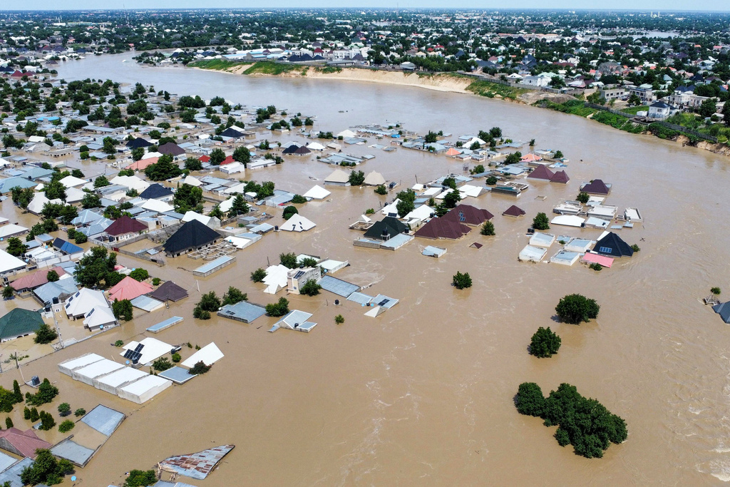 Houses and buildings are partially submerged following a dam collapse in Maiduguri, Nigeria, Tuesday, Sept 10, 2024 [Musa Ajit Borno/AP Photos]