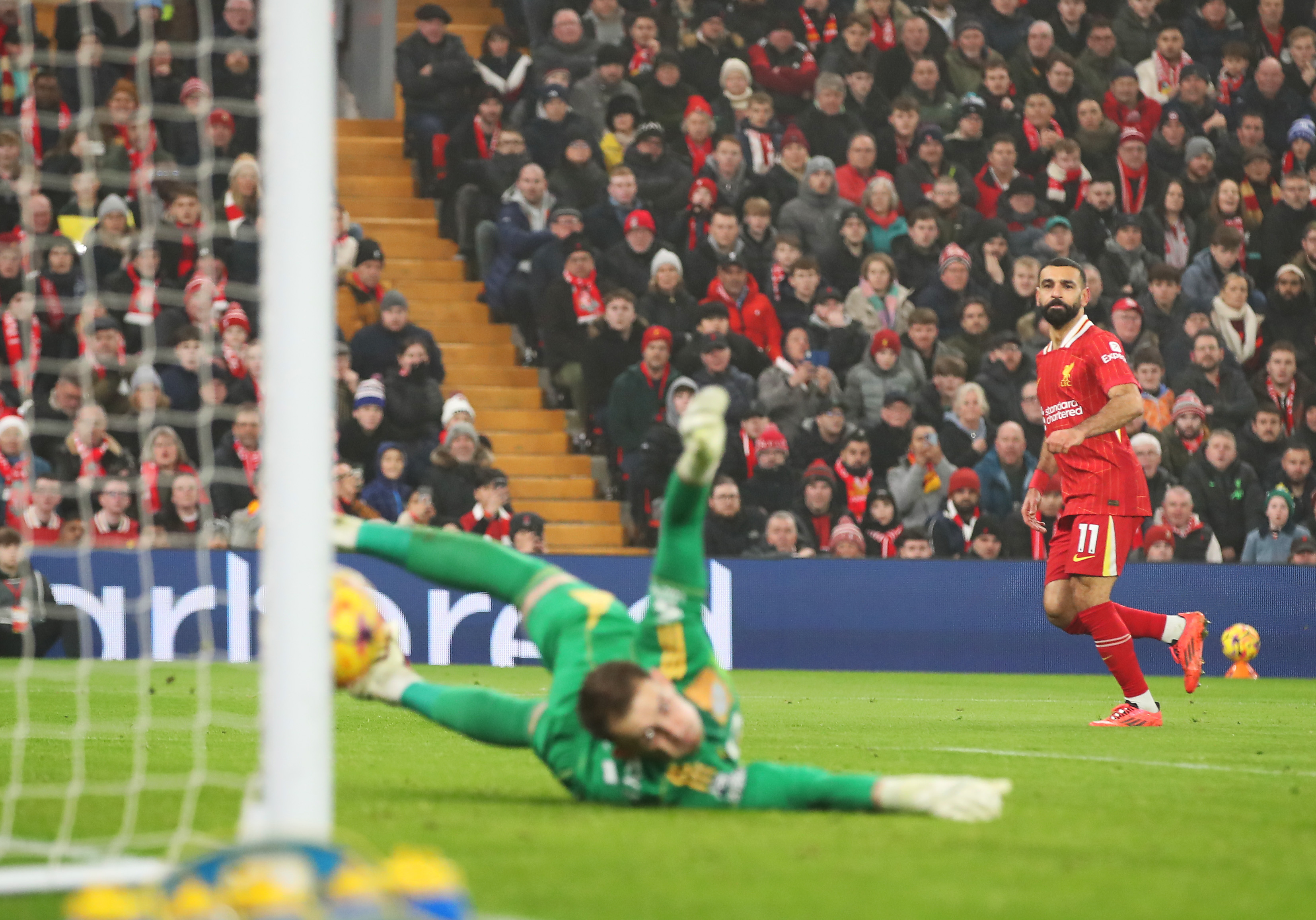 Mohamed Salah kicks goal.