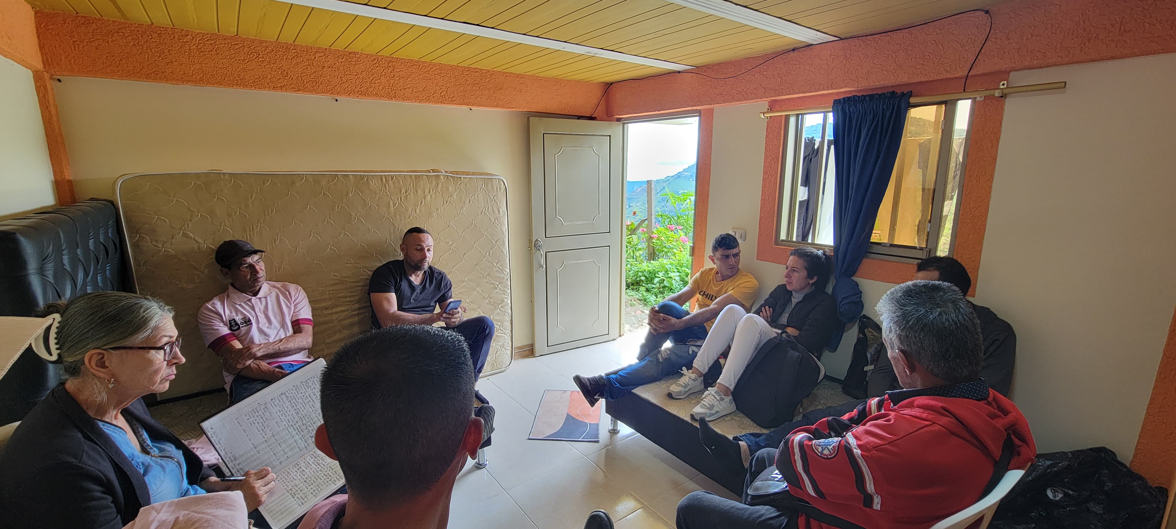 A meeting of the coffee farmers involved in the bear conservation project in El Aguila