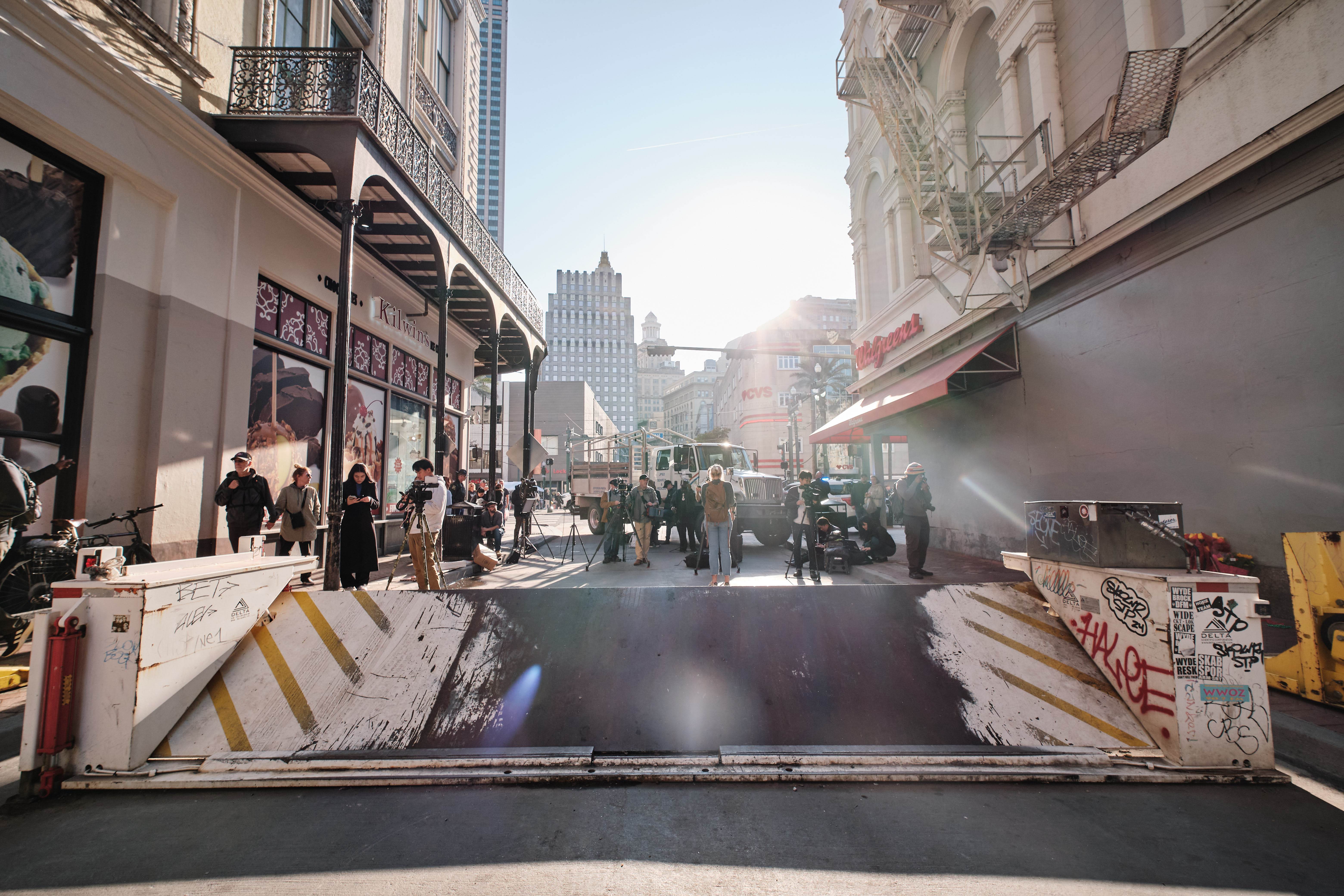 Members of the New Orleans Police Department walk a barrier stand at Bourbon Street after it is reopened to the public in New Orleans, Louisiana, USA, 02 January