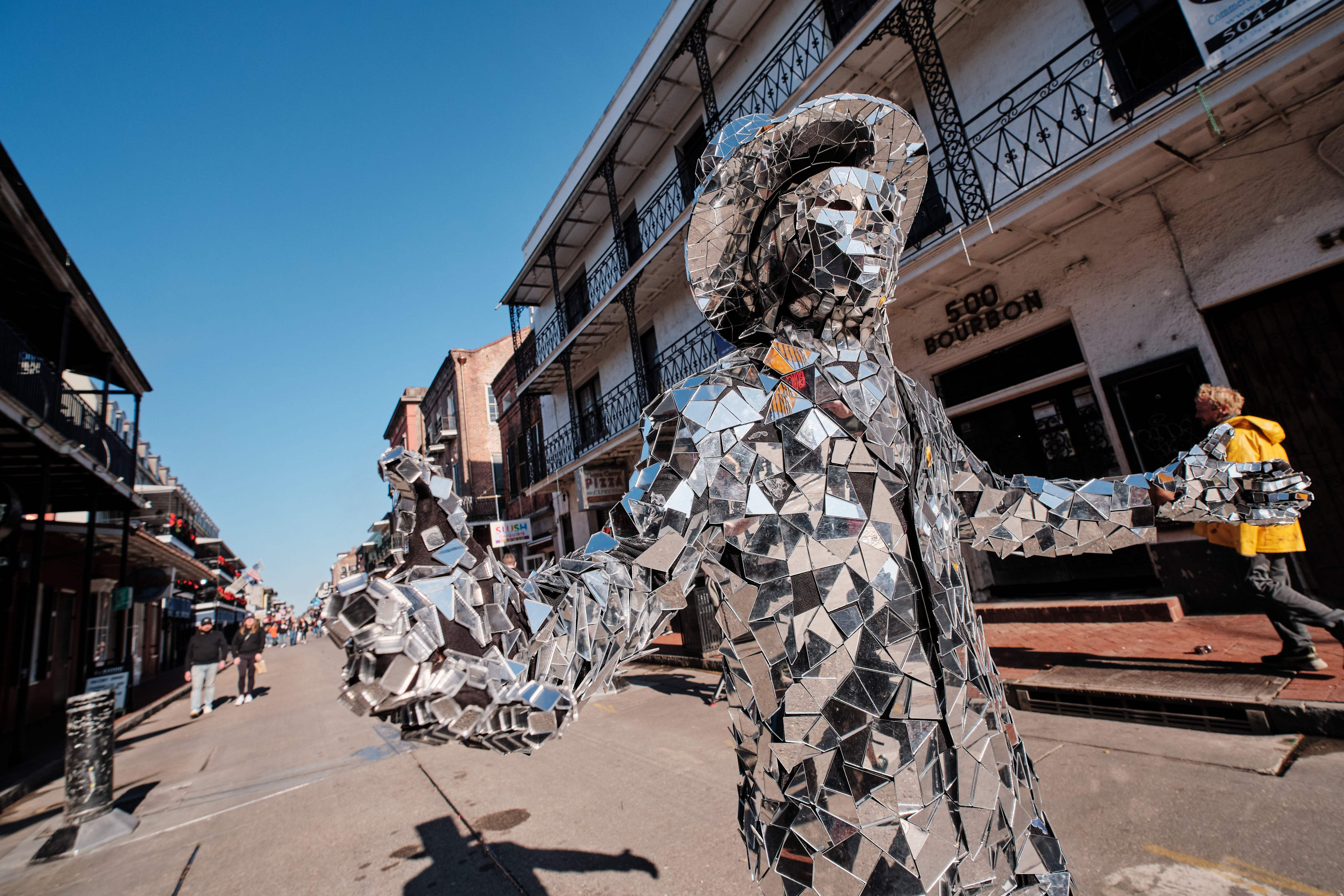 A street performer walks Bourbon Street after it is reopened to the public in New Orleans, Louisiana, USA, 02 January 2025