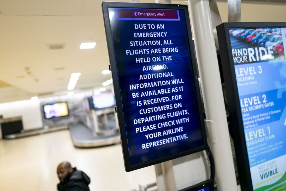 A screen shows information following a collision between a commercial airplane and a military helicopter at Ronald Reagan National Airport in Arlington, Virginia, USA, 29 January 2025. According to a preliminary statement from the United States Federal Aviation Administration (FAA), a PSA Airlines Bombardier CRJ700 regional jet that departed earlier today from Wichita, Kansas collided in midair with a Sikorsky H-60 helicopter while on approach to Reagan Washington National Airport. EPA-EFE/WILL OLIVER