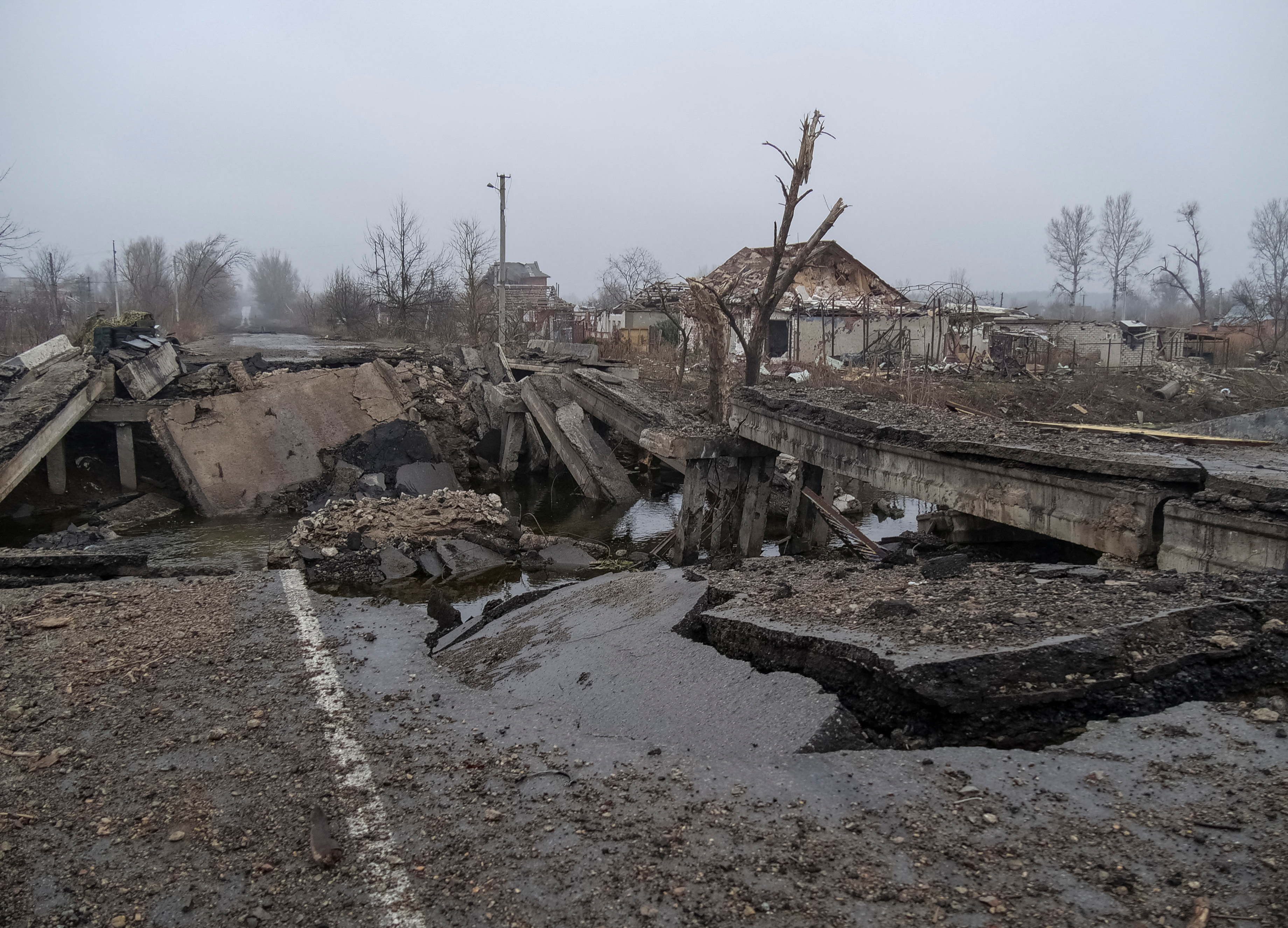 A destroyed bridge and houses are seen, amid Russia's attack on Ukraine, in the frontline village of Lyptsi in Kharkiv region, Ukraine January 27, 2025