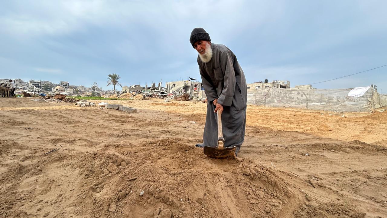 Abu Suleiman Zawaraa farms his land in Khan Younis