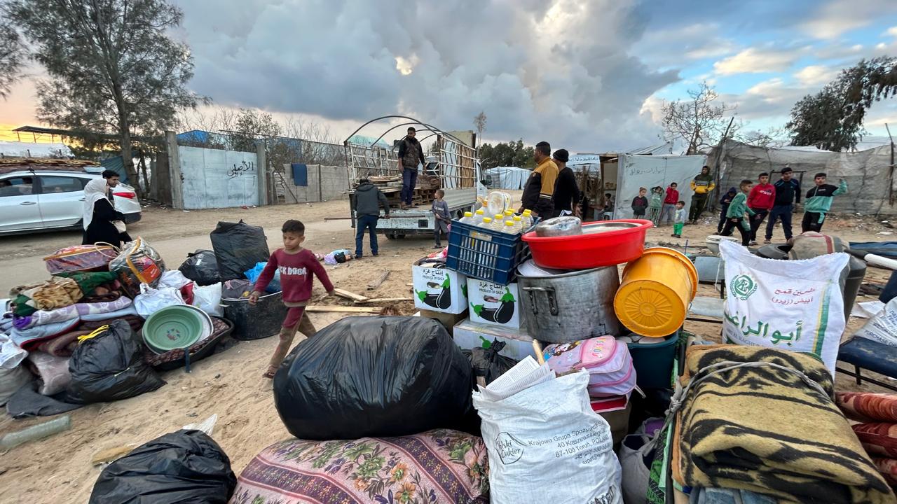Palestinian families packing their belongings in Khan Younis