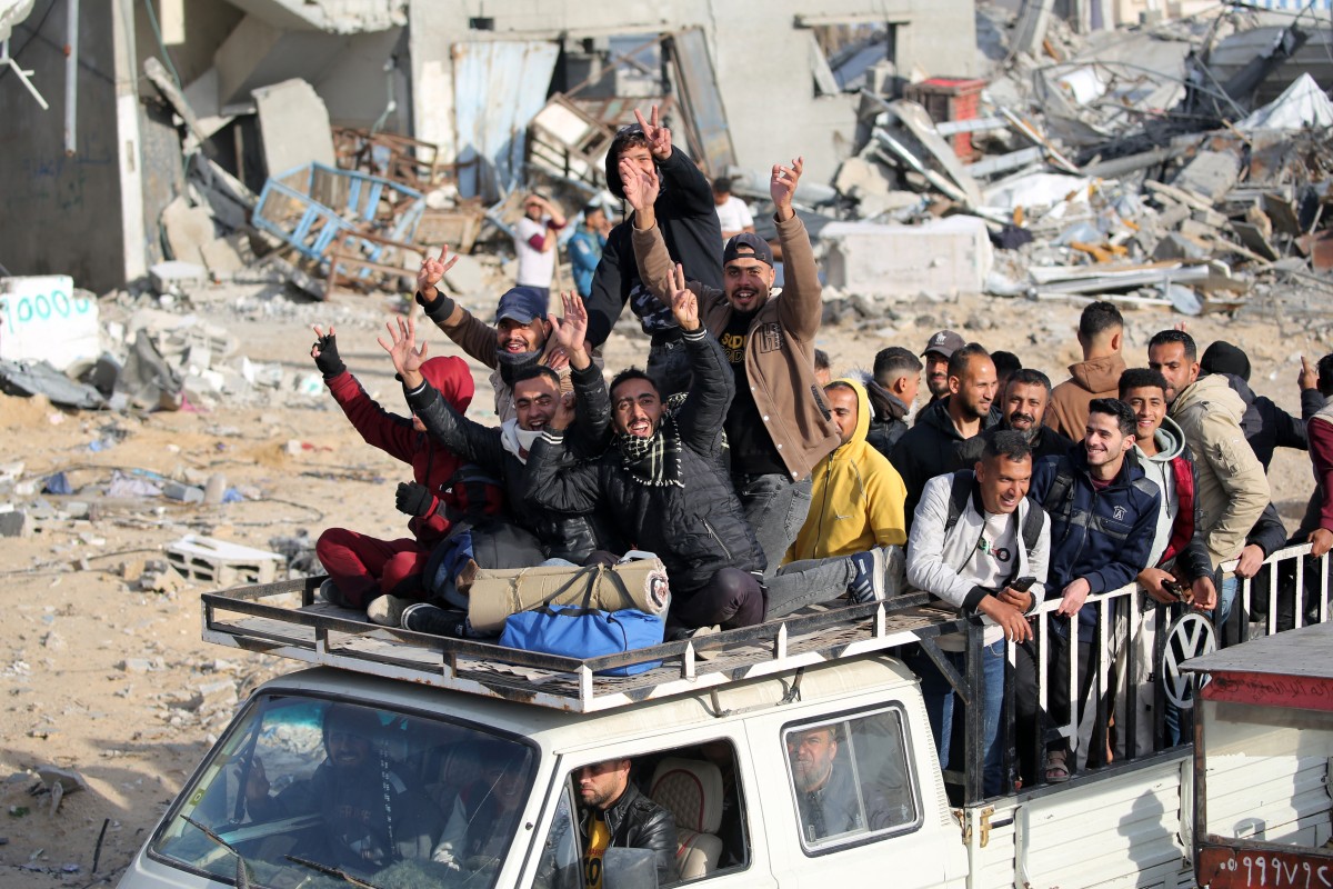 This aerial view shows displaced Palestinians returning to the war-devastated Rafah