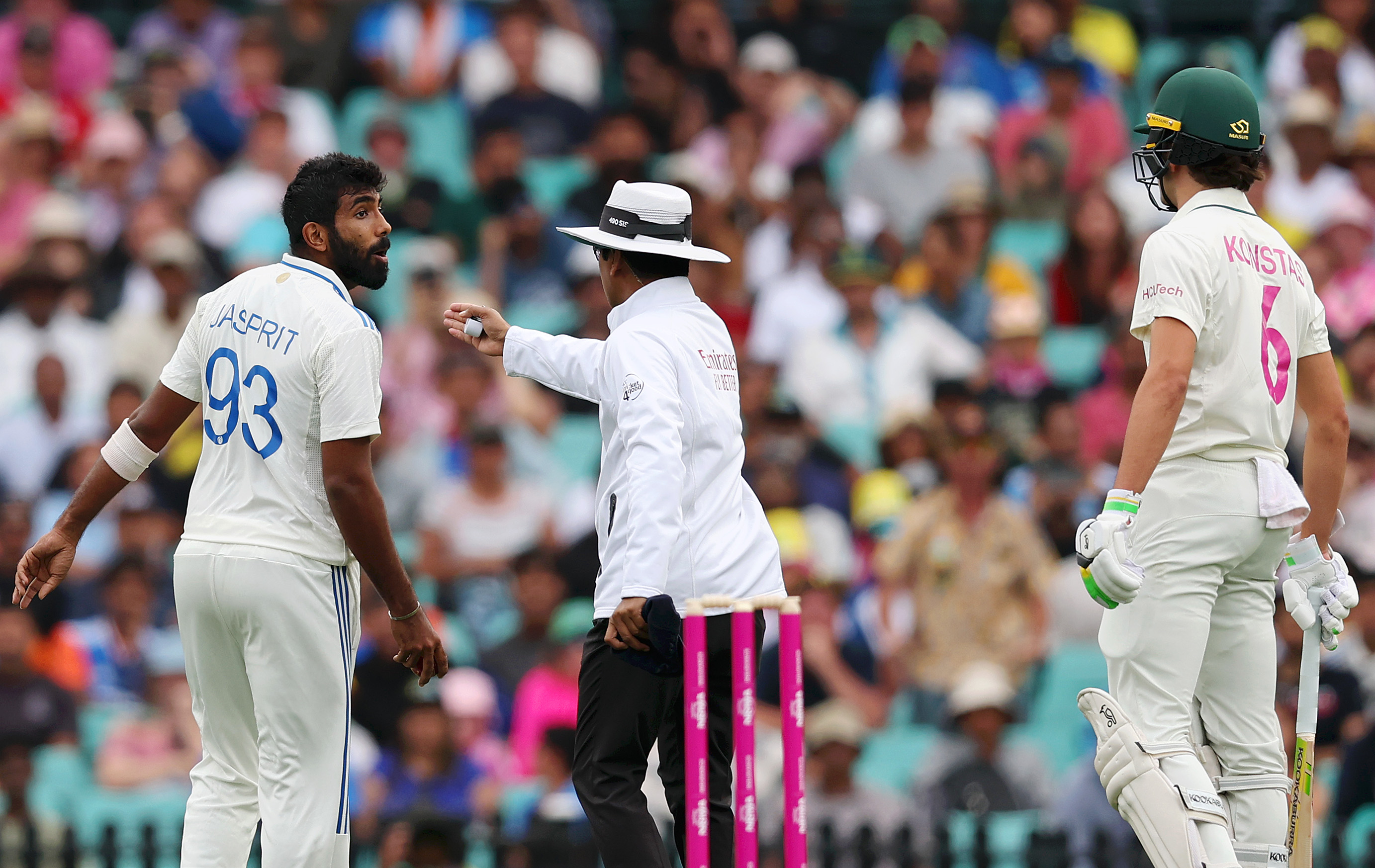 SYDNEY, AUSTRALIA - JANUARY 03: Jasprit Bumrah of India interacts with Sam Konstas of Australia during day one of the Fifth Men's Test Match in the series between Australia and India at Sydney Cricket Ground on January 03, 2025 in Sydney, Australia. (Photo by Cameron Spencer/Getty Images)