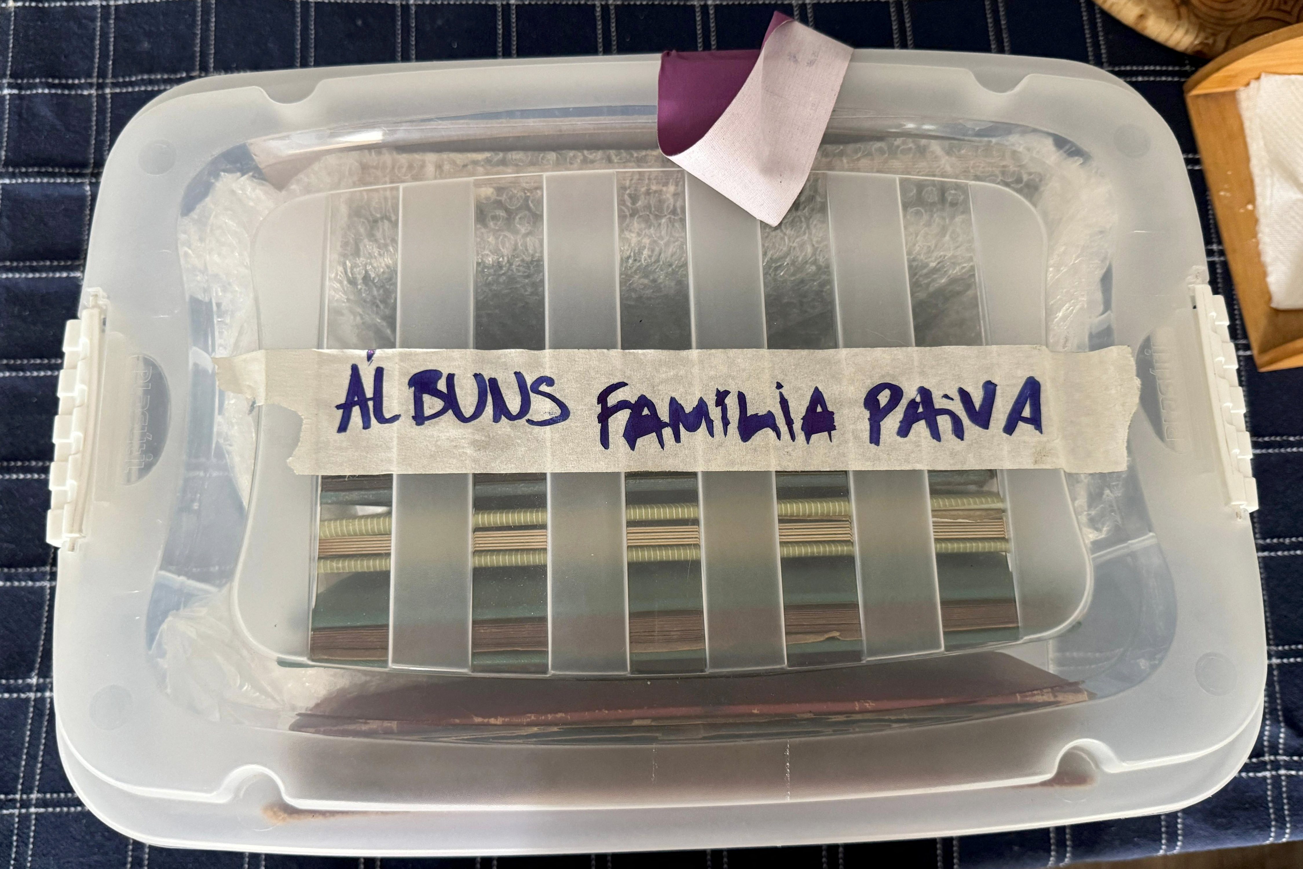 Family pictures are stored in a box at the home of Marcelo Rubens Paiva, son of Rubens Paiva, on January 27