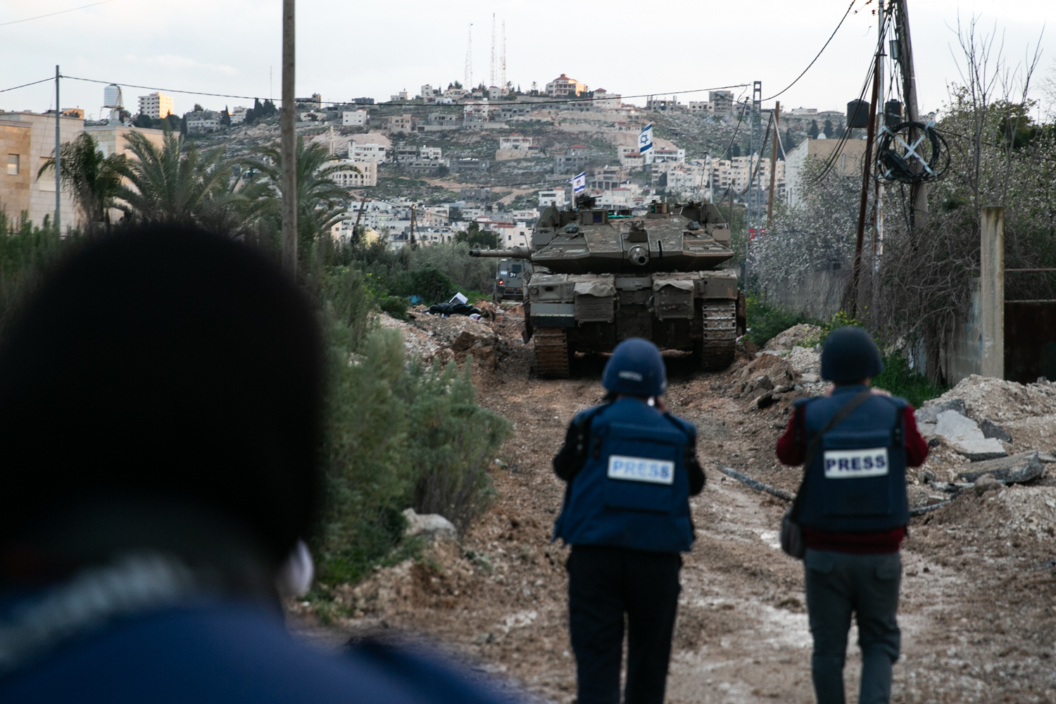Israeli bulldozers destroyed roads and infrastructure to allow for Israeli tanks to enter Jenin [Al Jazeera]