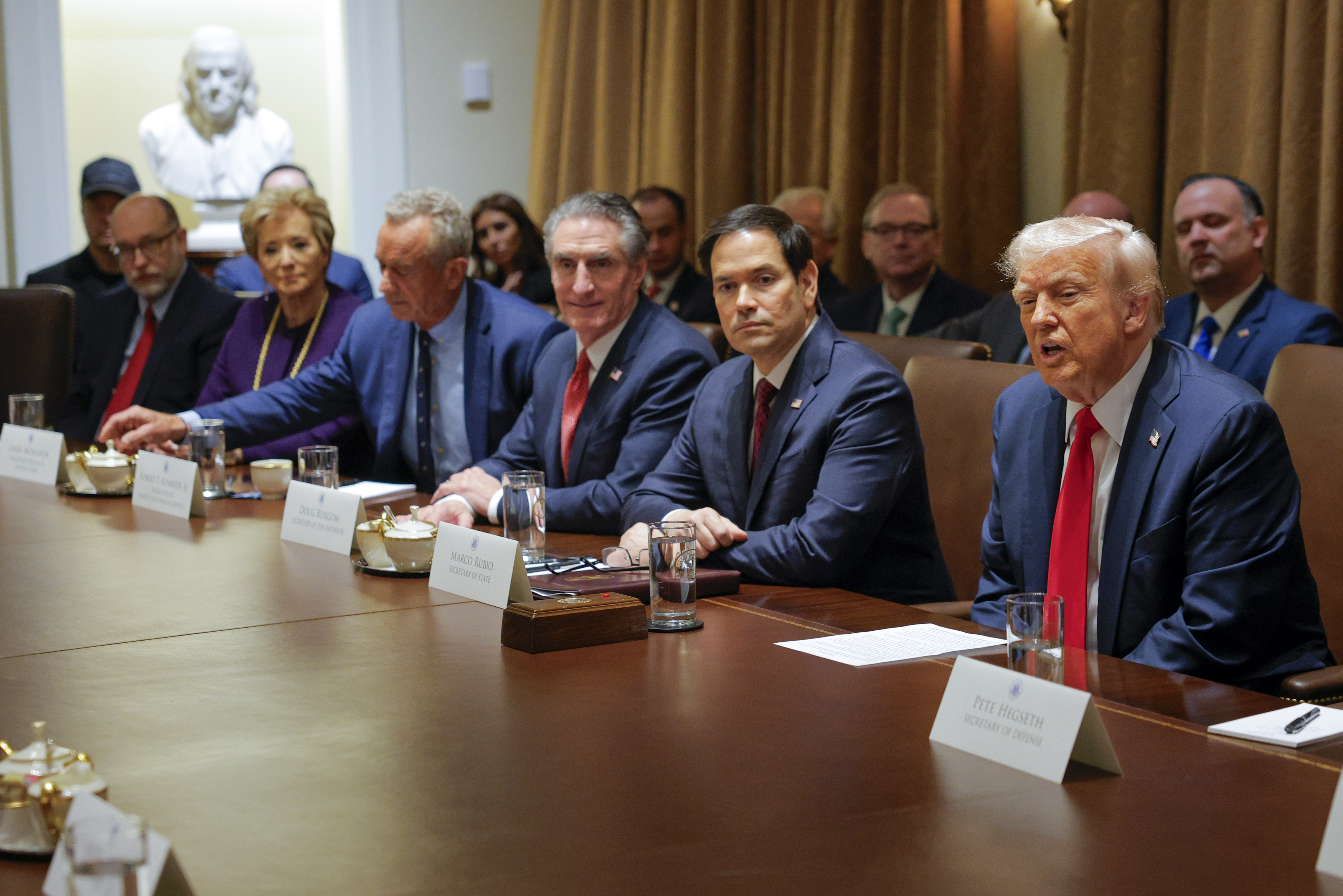 President Donald Trump speaks during a Cabinet meeting at the White House [Pool via AP]