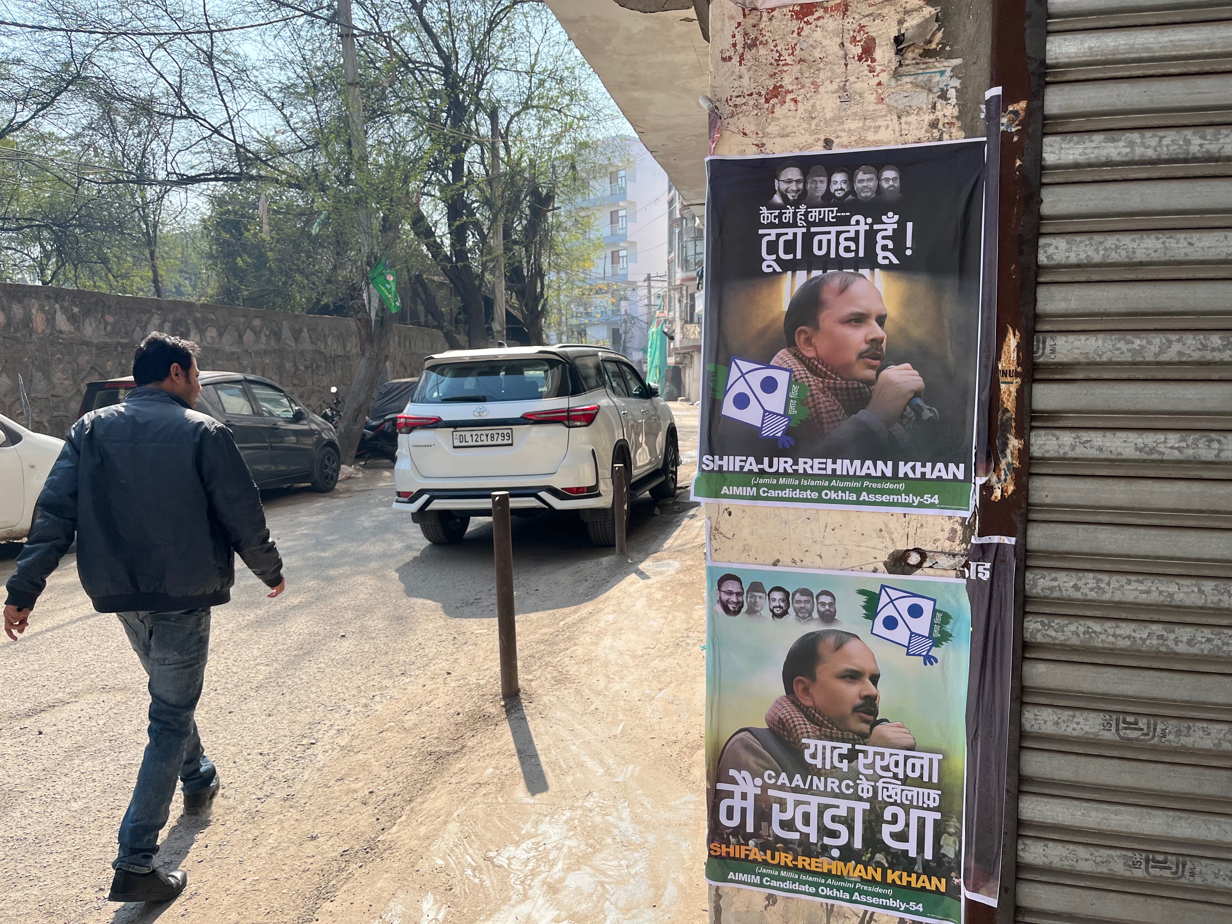 Posters of Shifa ur Rehman in lane leading to his home-1738569530