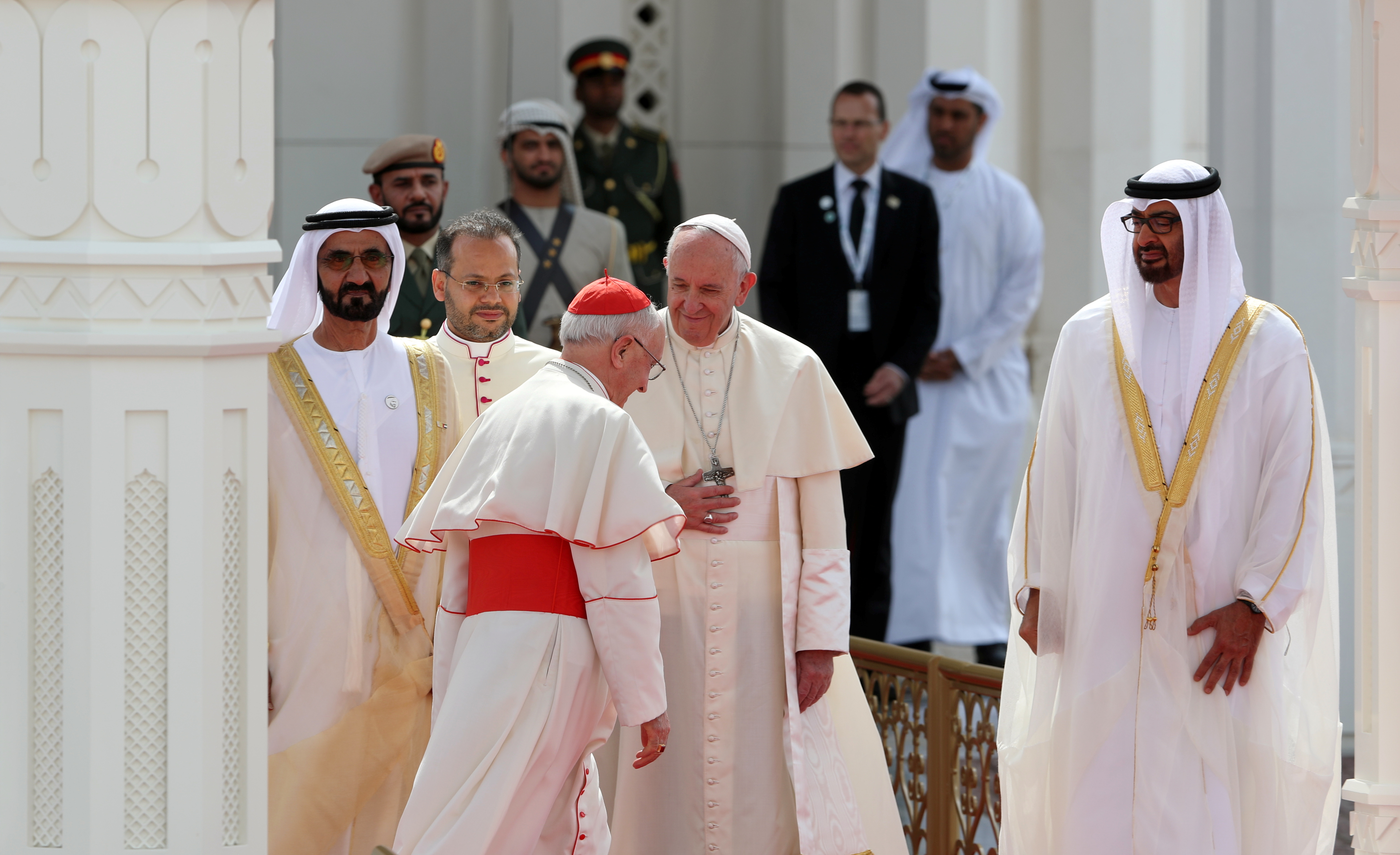 Pope Francis, head of the Catholic Church, is received by Vice-President of the United Arab Emirates and ruler of Dubai Sheikh Mohammed bin Rashid al-Maktoum and Abu Dhabi's Crown Prince Mohammed bin Zayed Al-Nahyan during a welcome ceremony at the Presidential Palace in Abu Dhabi, United Arab Emirates, February 4, 2019. REUTERS/Ahmed Jadallah
