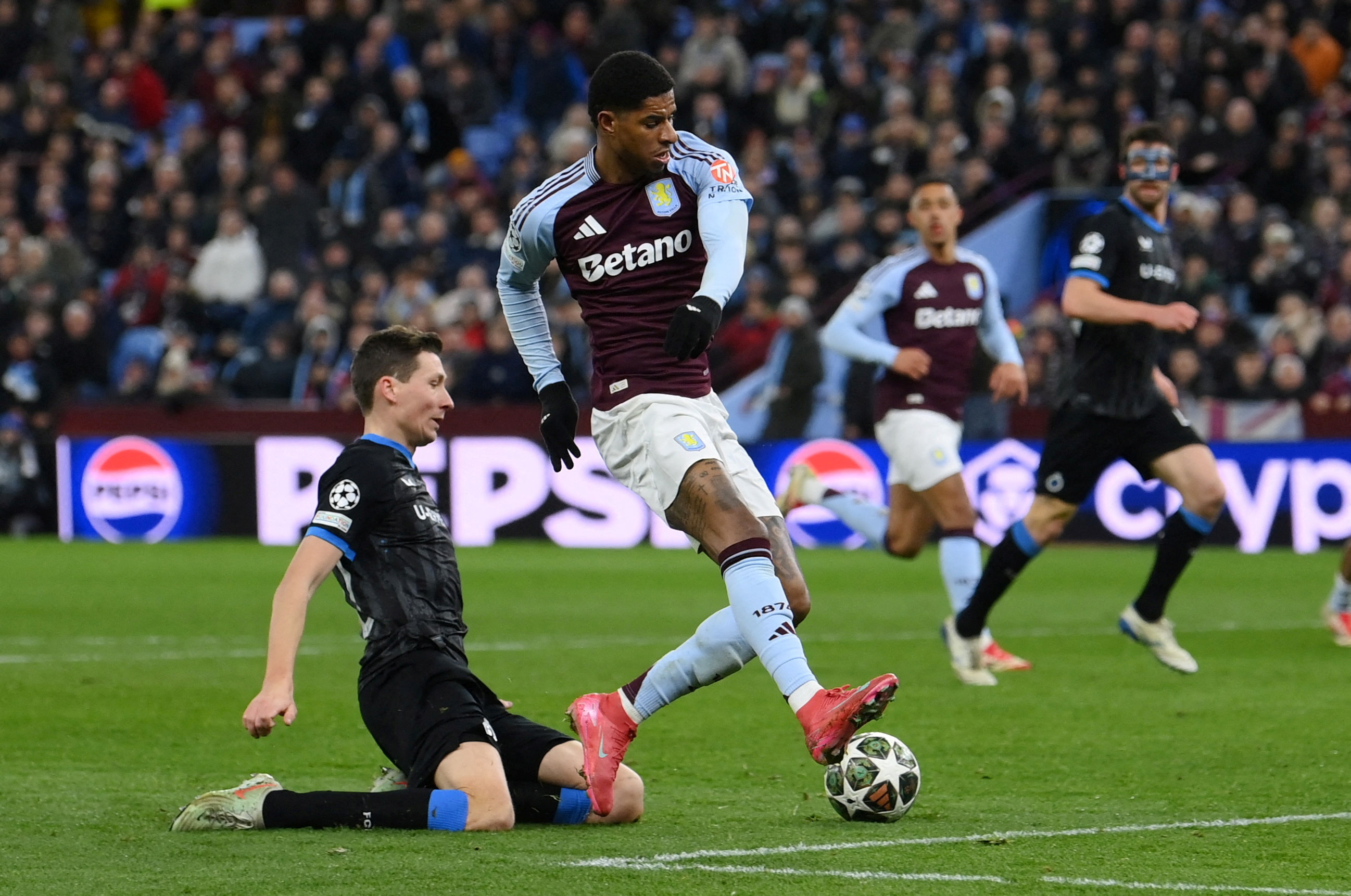 FILE PHOTO: Soccer Football - Champions League - Round of 16 - Second Leg - Aston Villa v Club Brugge - Villa Park, Birmingham, Britain - March 12, 2025 Aston Villa's Marcus Rashford in action REUTERS/Jaimi Joy/File Photo