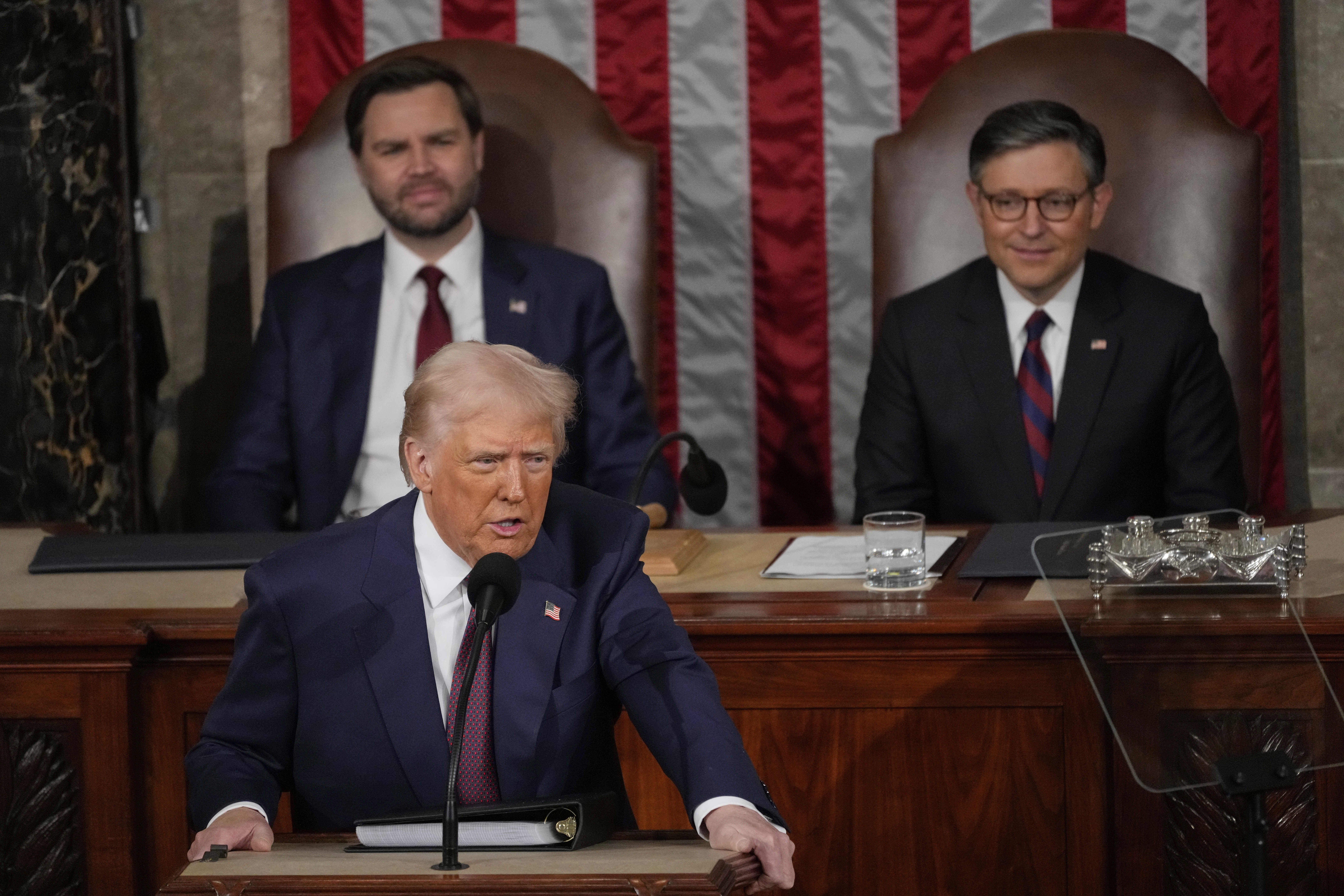 President Donald Trump talks about Greenland as he addresses a joint session of Congress in the House chamber at the U.S. Capitol in Washington
