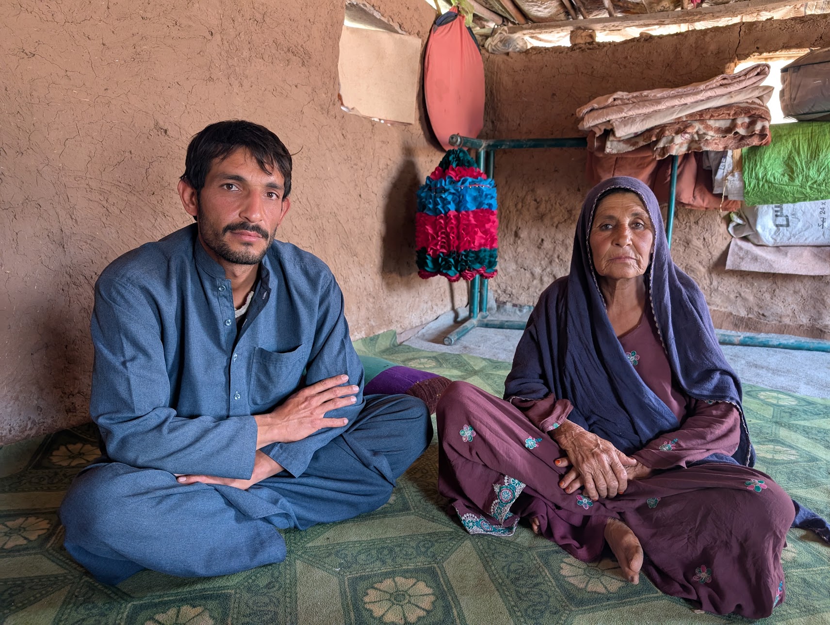Mohammad Laal Khan (left) and his mother Guldana Bibi