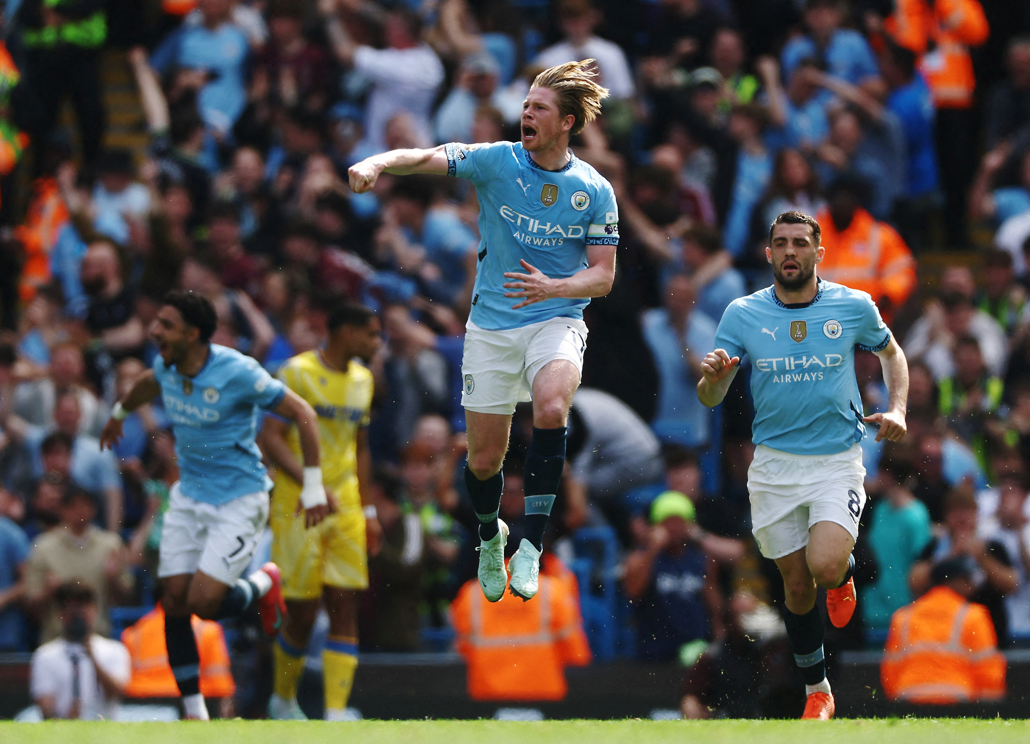 Manchester City's Kevin De Bruyne celebrates scoring their first goal.