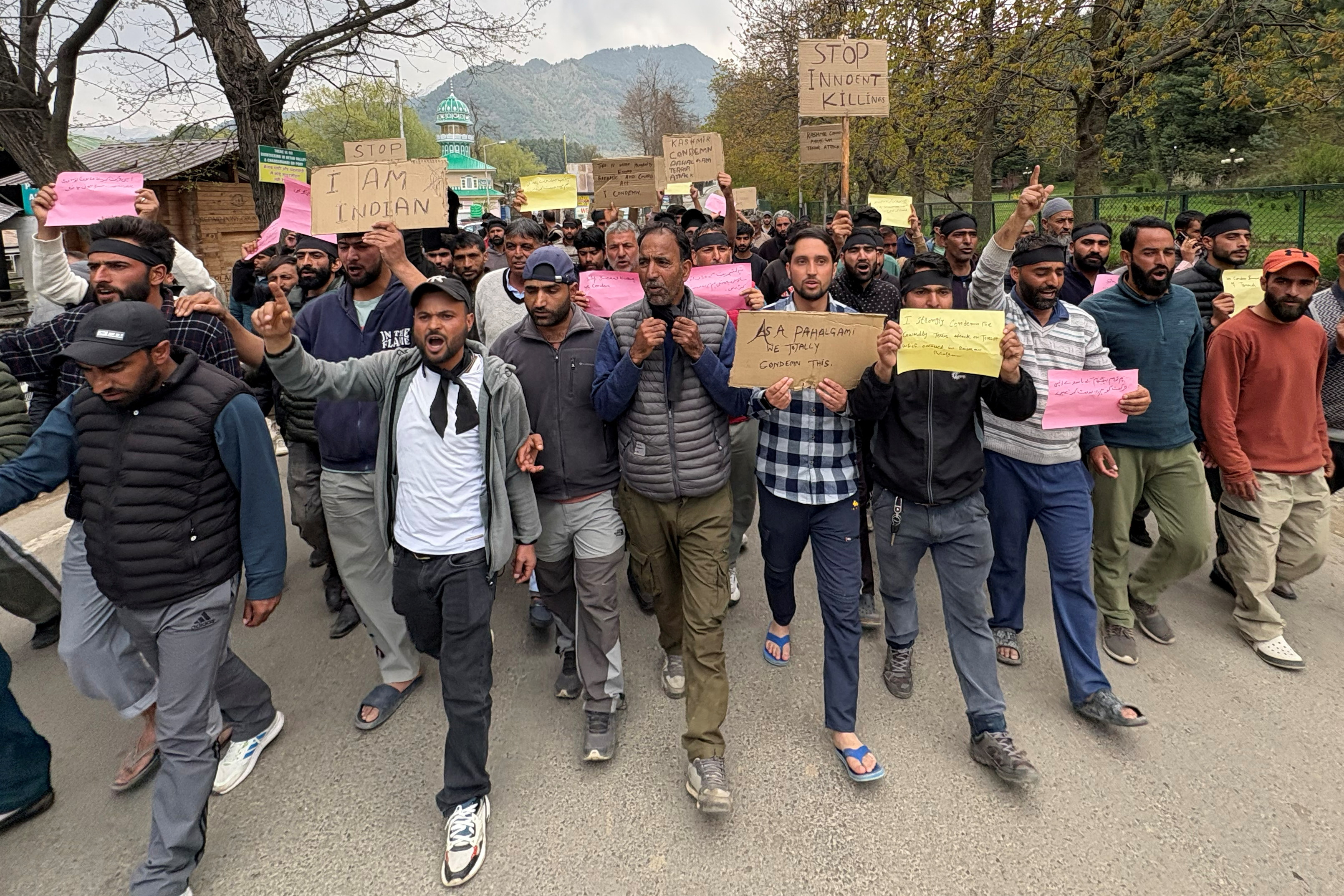 Members from Pahalgam Taxi Owners Association and pony owners shout slogans during a protest against the attack on tourists in south Kashmir's scenic Pahalgam following a suspected militant attack, April 23, 2025.