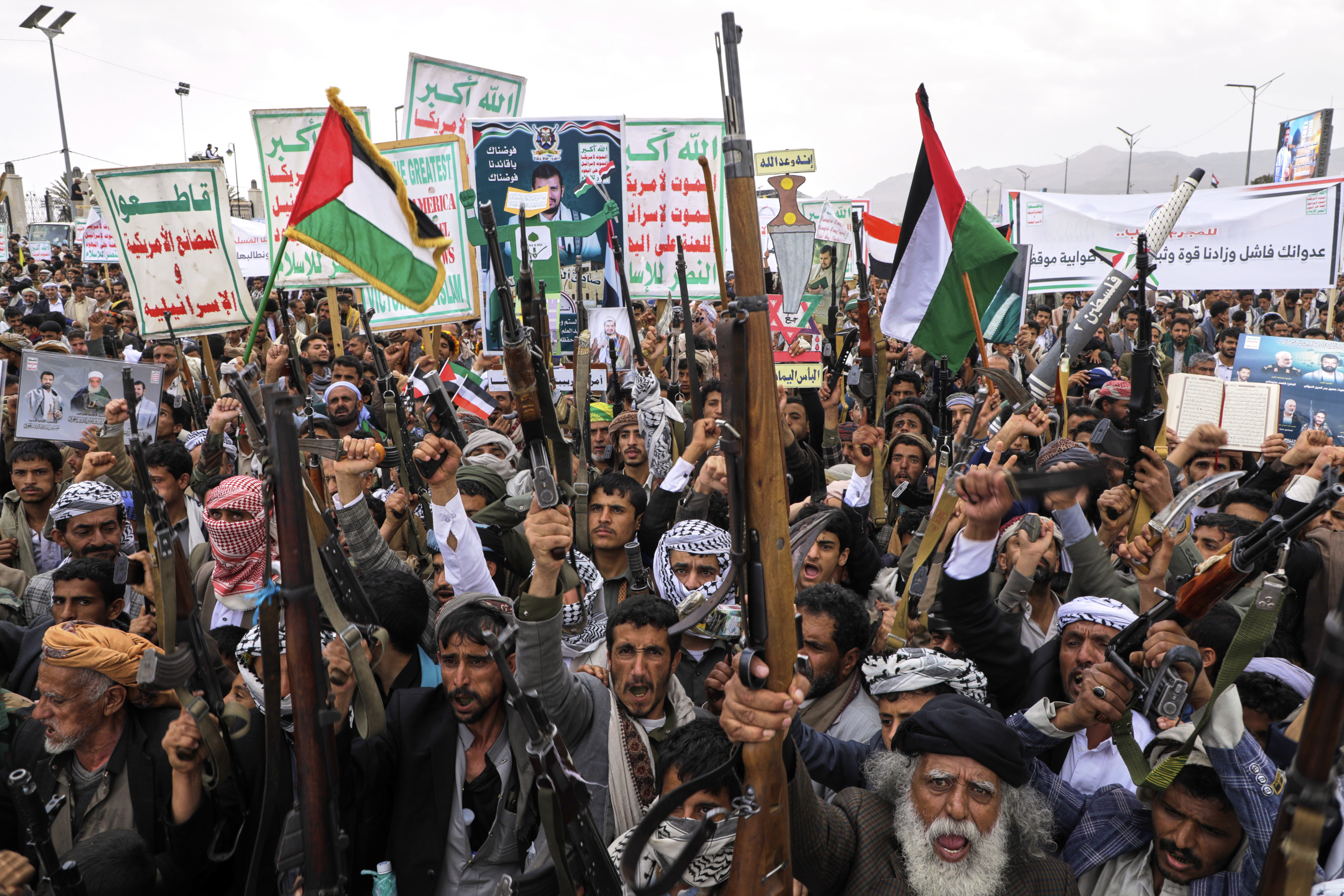 Houthi supporters chant slogans during a weekly, anti-US and anti-Israel rally in Sanaa, Yemen, Friday, April 18, 2025