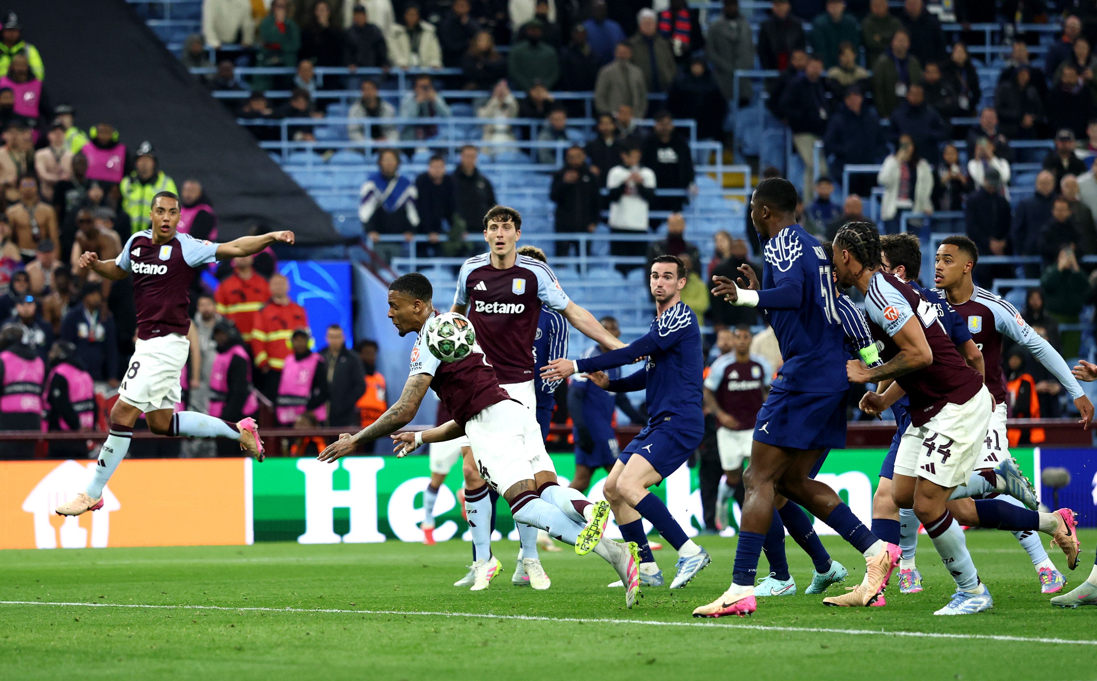 BIRMINGHAM, ENGLAND - APRIL 15: Ezri Konsa of Aston Villa misses a header during the UEFA Champions League 2024/25 Quarter Final Second Leg match between Aston Villa FC and Paris Saint-Germain at Villa Park on April 15, 2025 in Birmingham, England. (Photo by Dan Istitene/Getty Images)