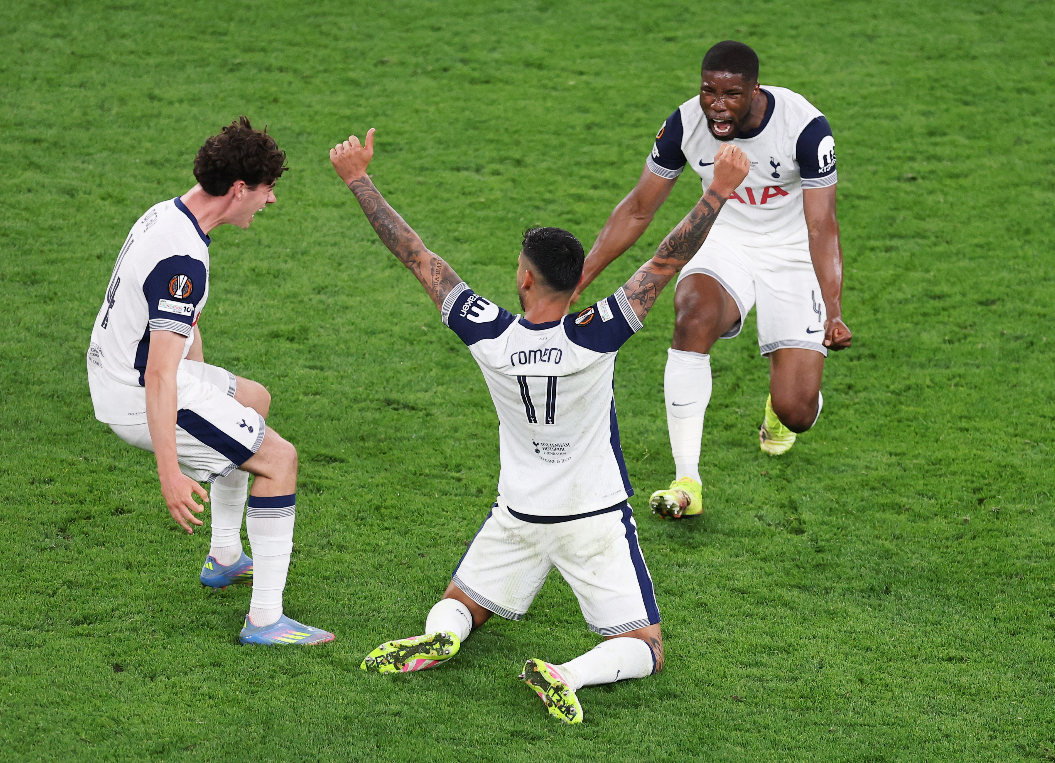 Europa League - Final - Tottenham Hotspur v Manchester United - San Mames, Bilbao, Spain - May 21, 2025 Tottenham Hotspur's Kevin Danso, Cristian Romero and Archie Gray celebrate winning the Europa League
