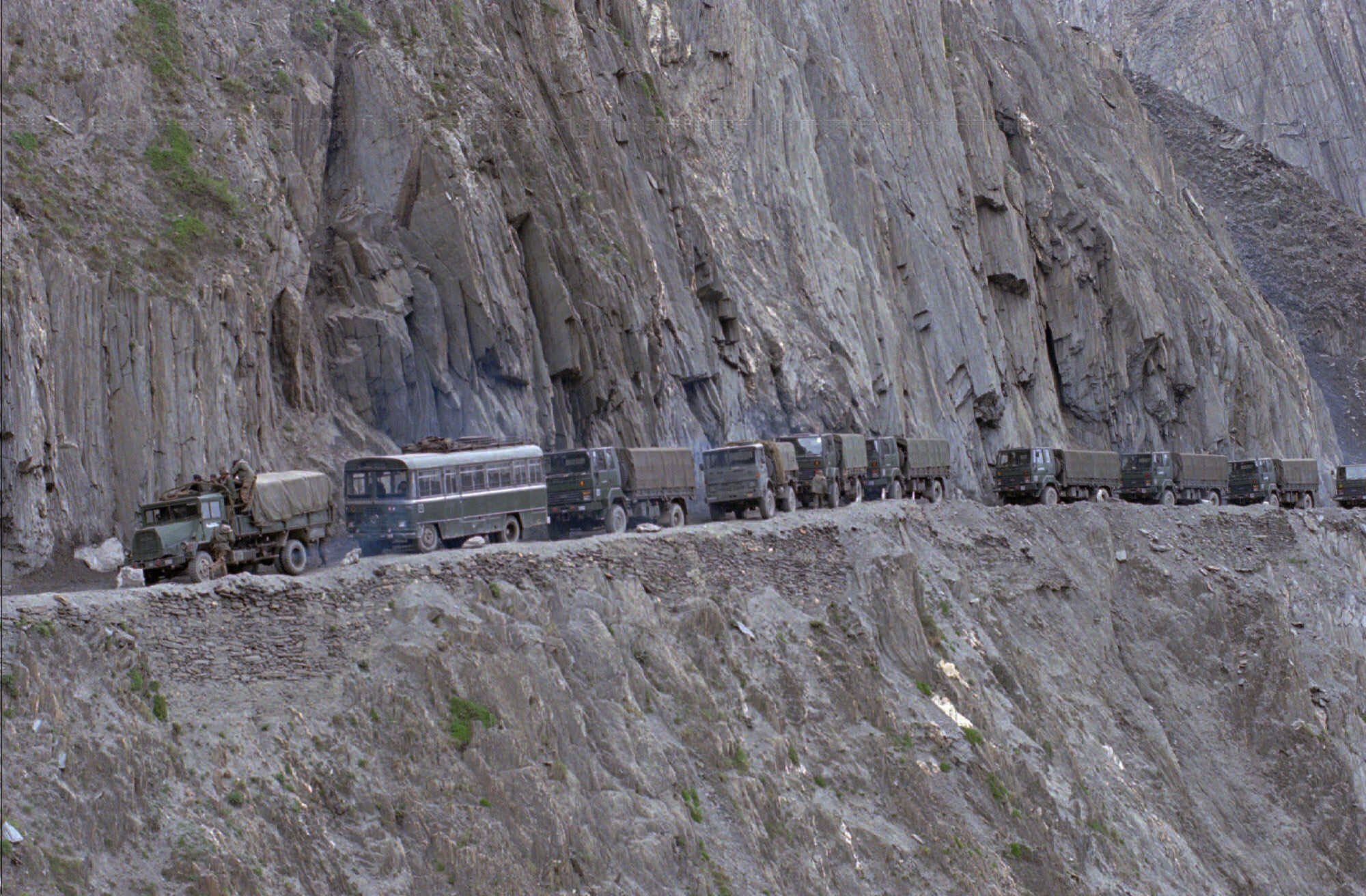 In this June 5, 1999, file photo, an Indian army convoy of reinforcement moves towards the Indian border town of Kargil, near