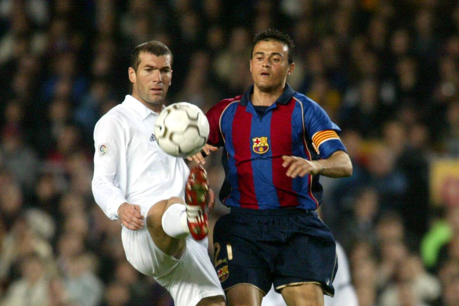 Zinedine Zidane and Luis Enrique in action.
