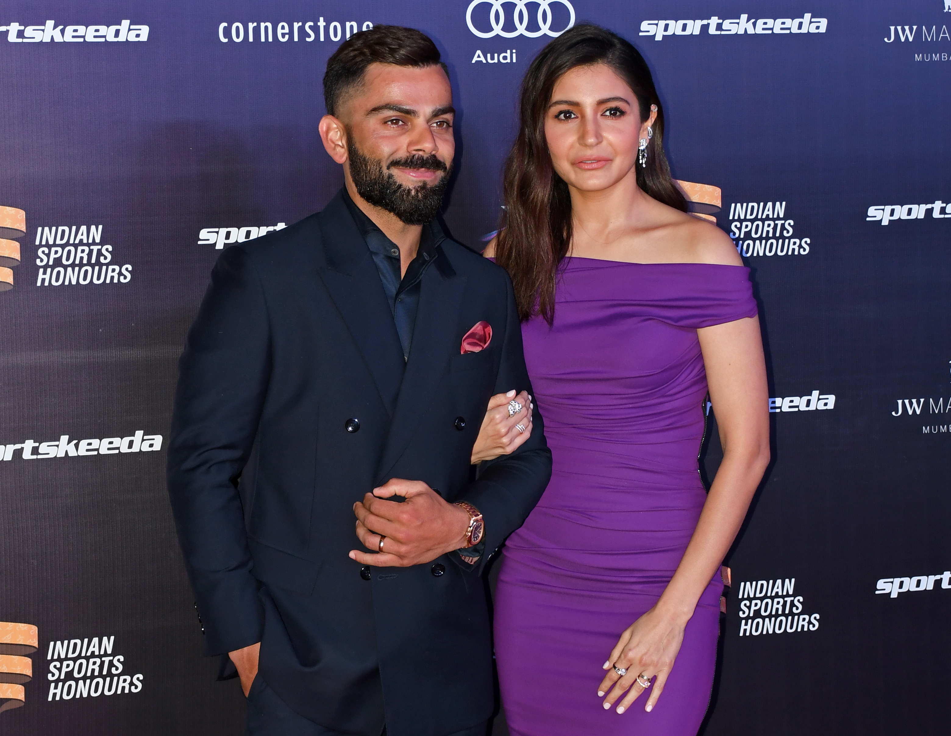 Cricketer Virat Kohli, left, and his wife, Bollywood actress Anushka Sharma, pose for a photo during the Indian Sports Honours red carpet in Mumbai, India, on March 23, 2023