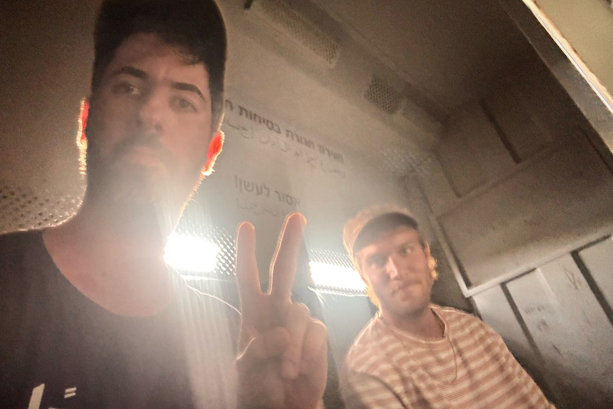 Standing Together's Alon-Lee Green takes a selfie from the back of the police wagon following his arrest [Courtesy of Alon-Lee Green]