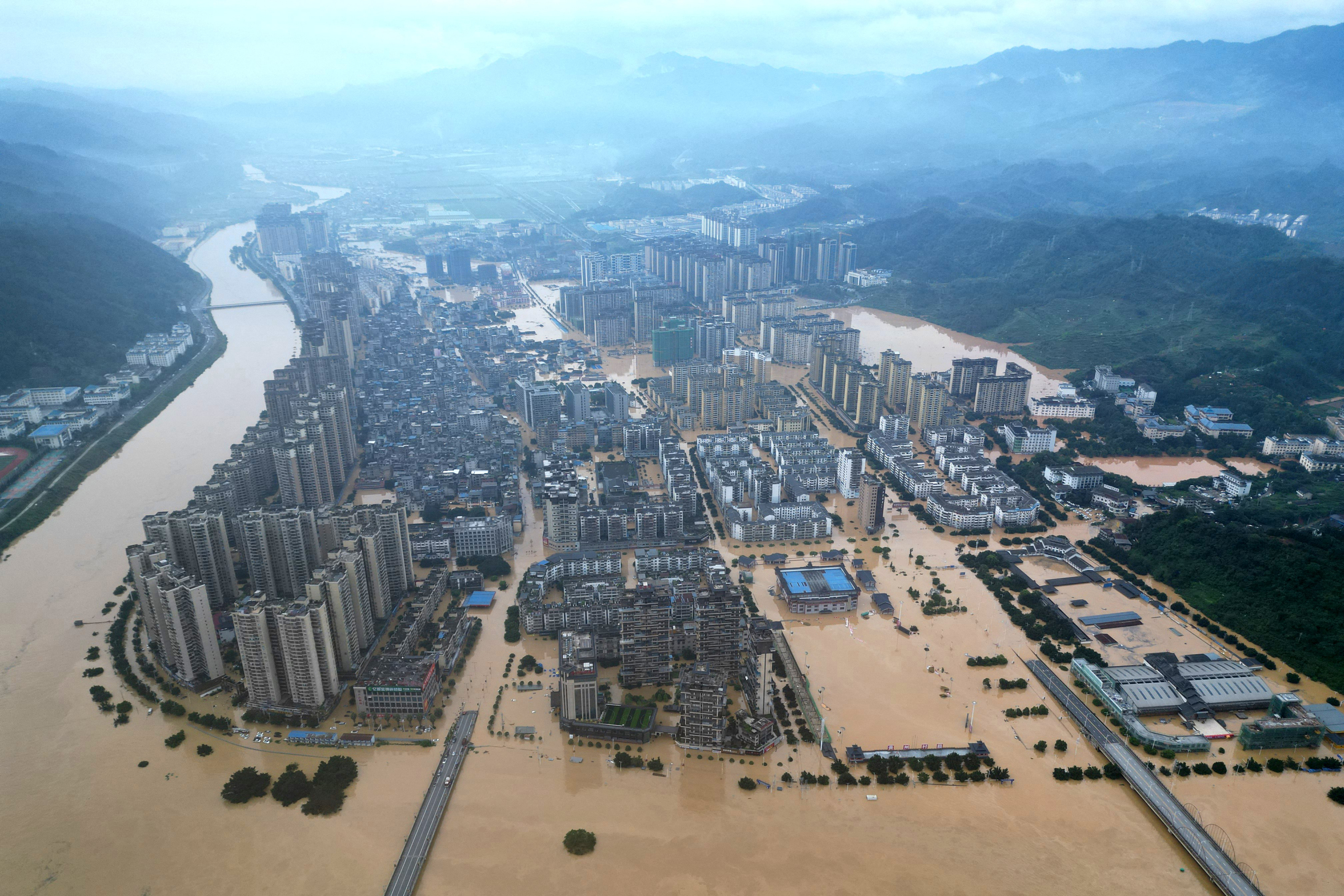 China floods leave six dead and thousands displaced