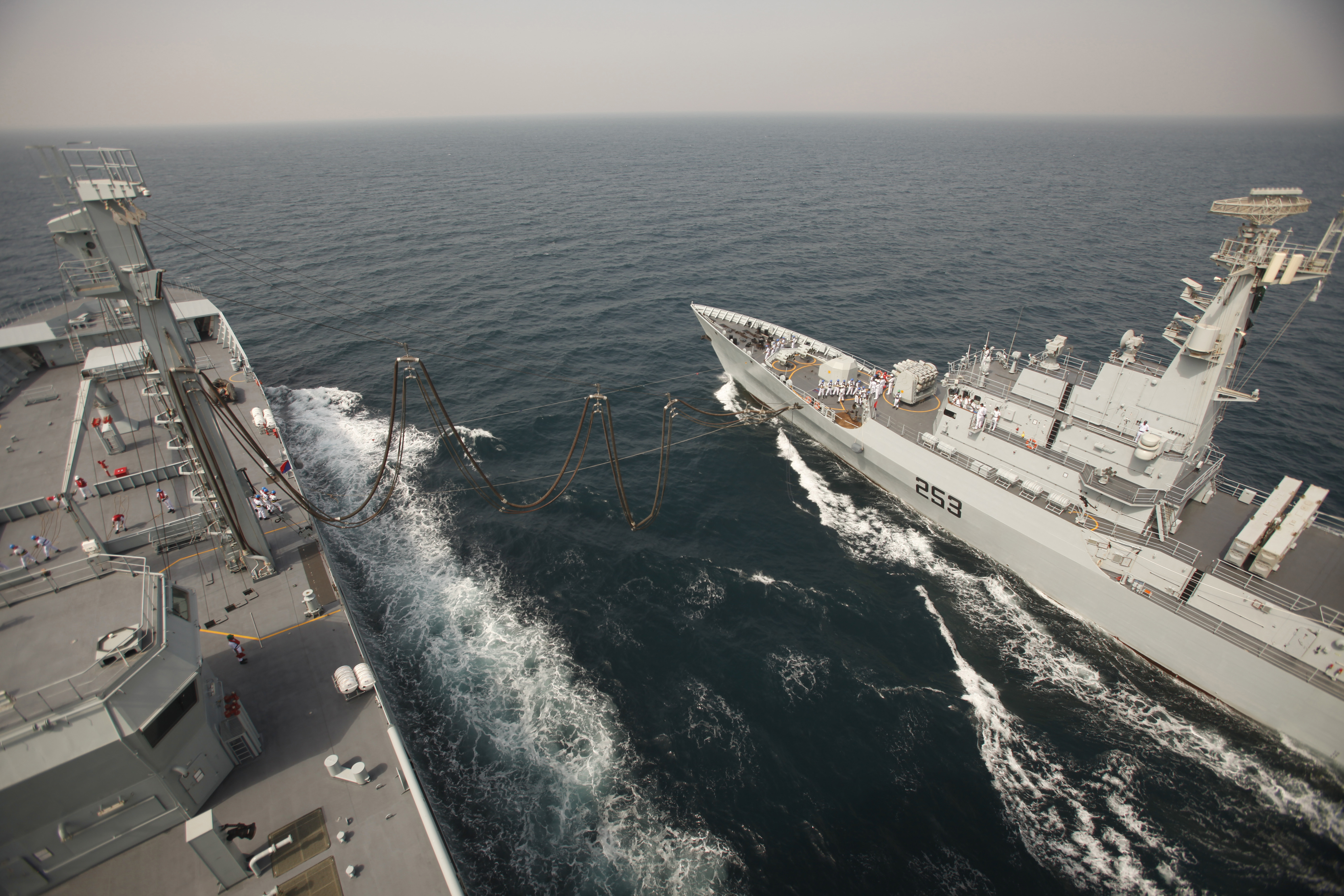 Ships take part in Pakistan Navy's Multinational Exercise AMAN-19, in Karachi, Pakistan, Monday, Feb. 11, 2019. A five-day multinational exercise hosted by Pakistan Navy has begun near the southern port city of Karachi in an effort aimed at enhancing cooperation in keeping the seas safe from pirates, terrorists and smugglers. (AP Photo/Fareed Khan)