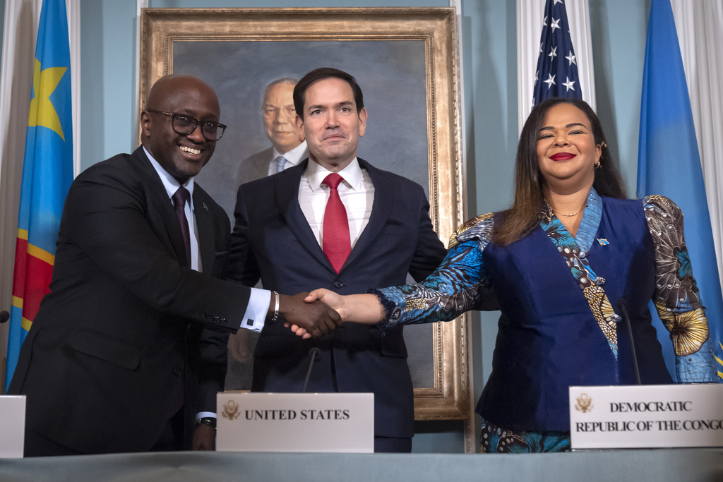 US Secretary of State Marco Rubio, centre, stands with Rwanda's Foreign Minister Olivier Nduhungirehe, left, and Democratic Republic of the Congo's Foreign Minister Therese Kayikwamba Wagner.