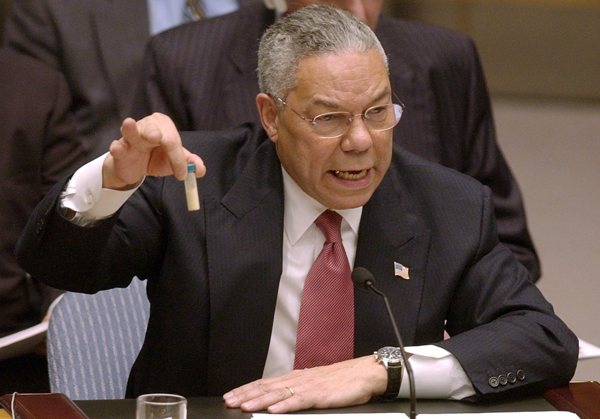 FILE - Secretary of State Colin Powell holds up a vial he said could contain anthrax as he presents evidence of Iraq's alleged weapons programs to the United Nations Security Council in this Feb. 5, 2003 file photo. Israeli Prime Minister Benjamin Netanyahu's use of a cartoon-like drawing of a bomb to convey a message over Iran's disputed nuclear program this week, follows in a long and storied tradition of leaders and diplomats using props to make their points at the United Nations. (AP Photo/Elise Amendola, File)