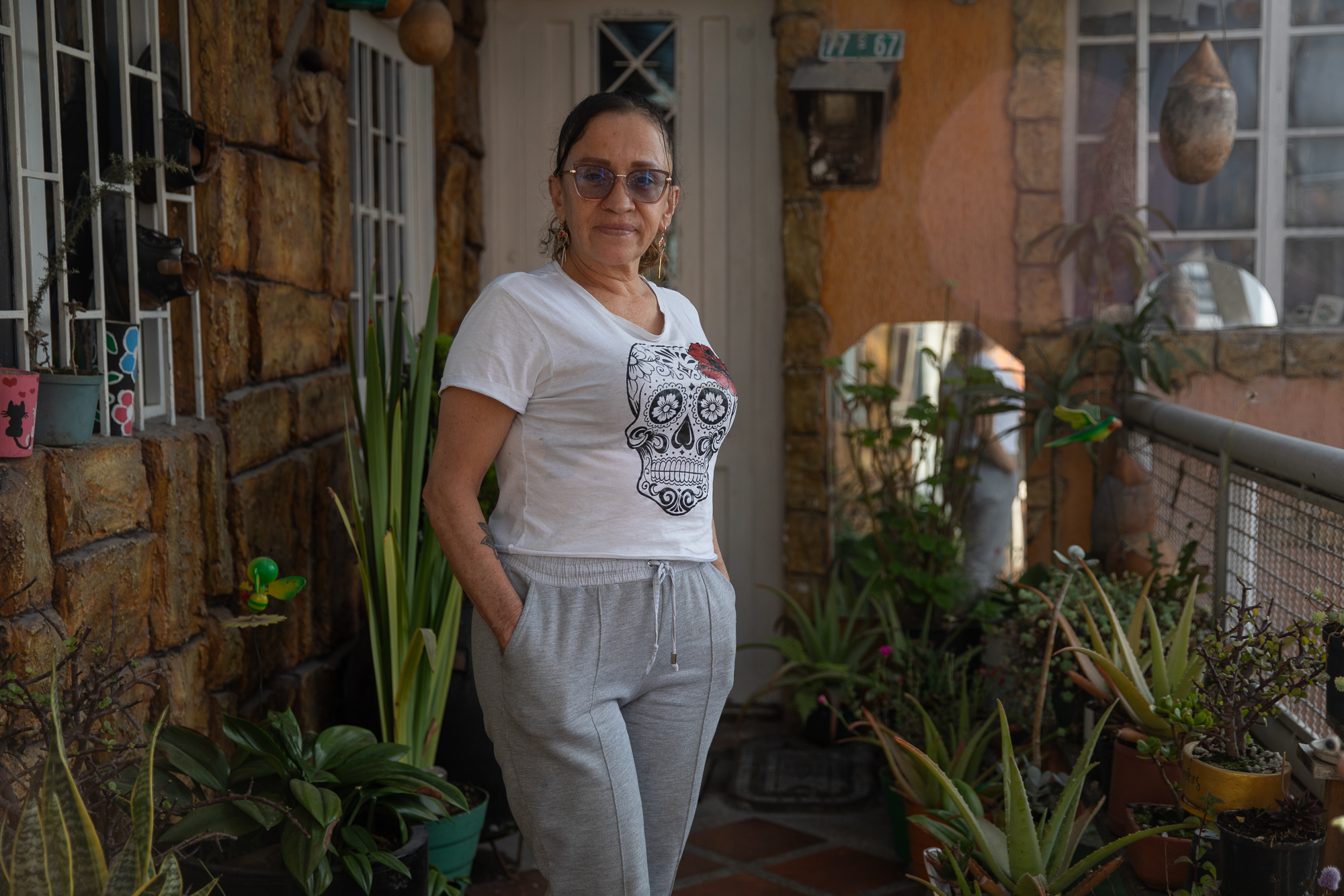 Jacqueline Plata stands in her home.