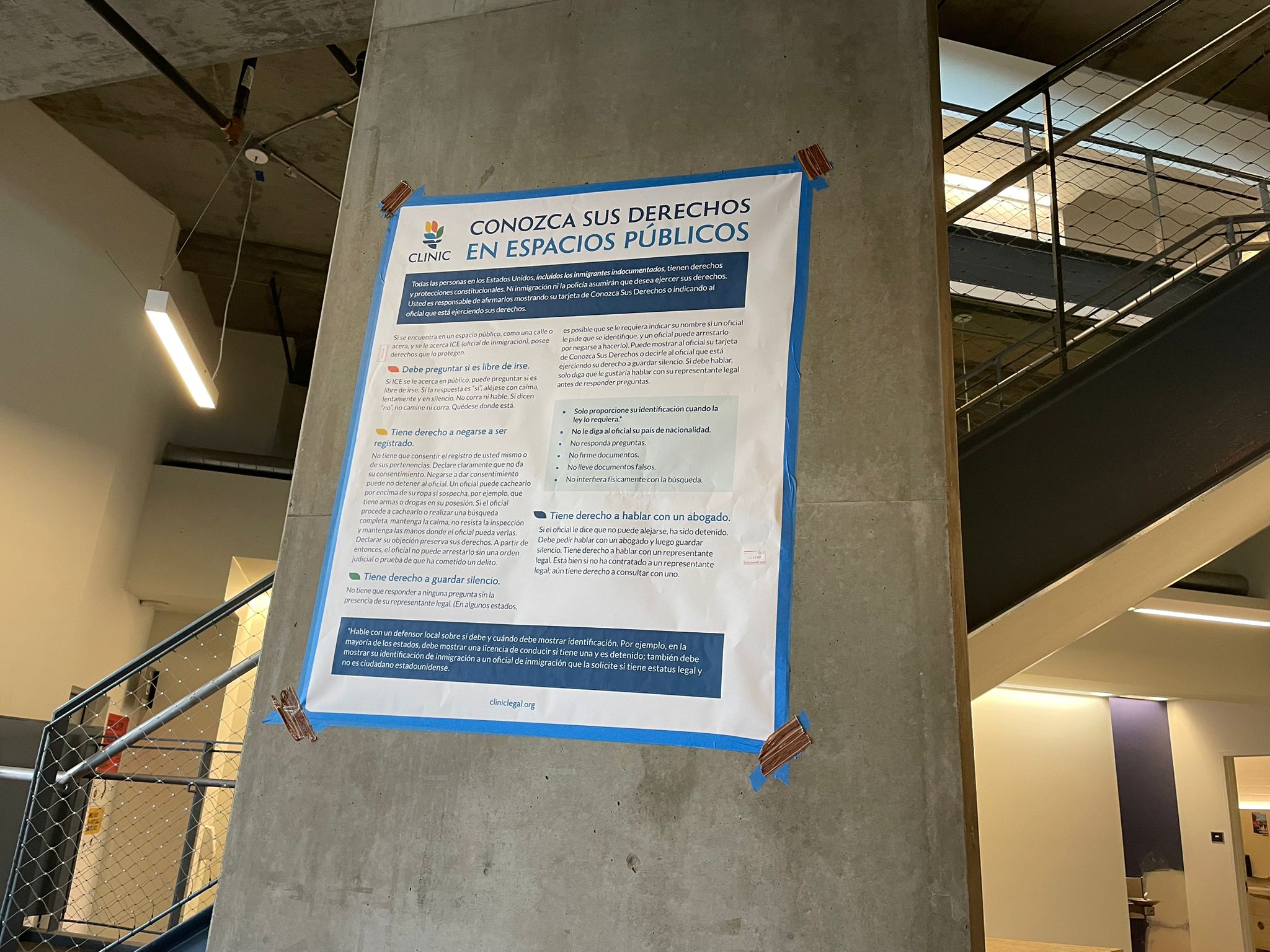 An informative poster taped to a pillar