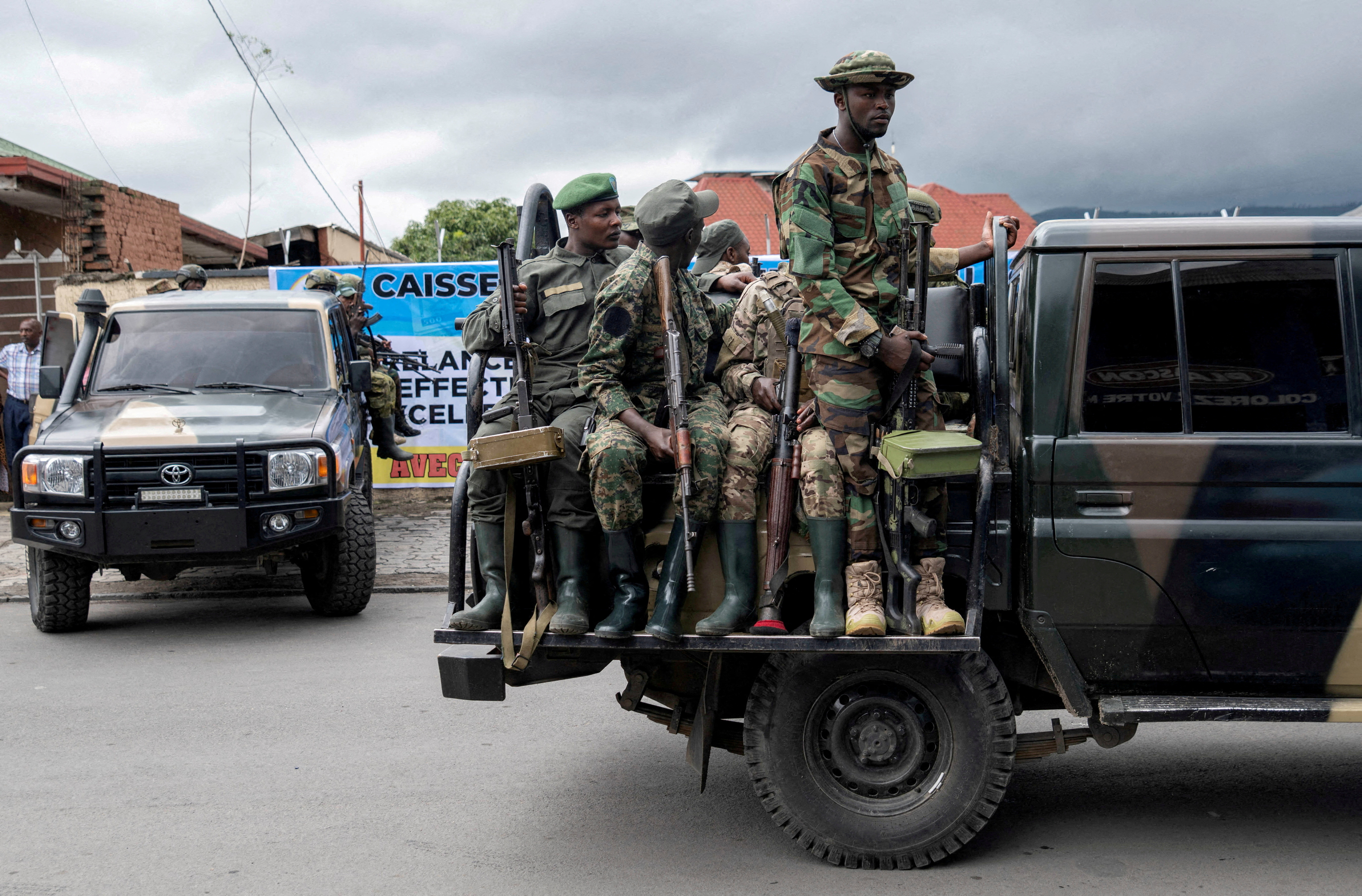 Members of the M23 rebel group mount their vehicles after the opening ceremony of Caisse Generale d'epargne du Congo in Goma, North Kivu province in the East of the Democratic Republic of Congo, April 7, 2025. [File: Arlette Bashizi/Reuters]