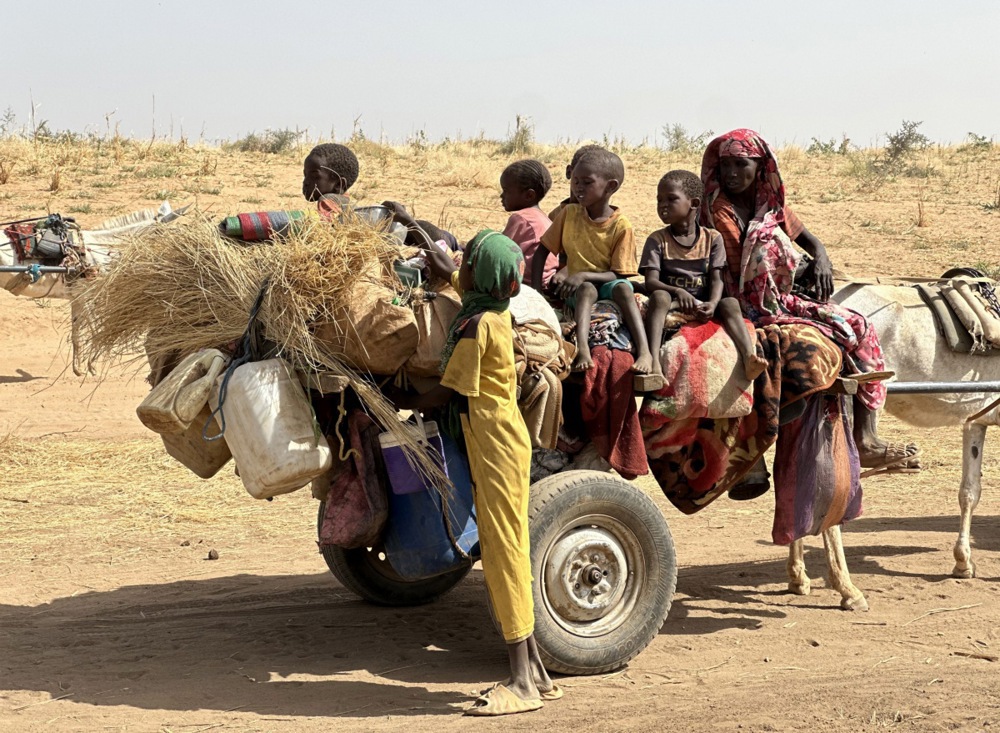 epa12047298 Sudanese people, who fled from the internally displaced persons (IDP) Zamzam camp, on their way to the Tawila Camps amid the ongoing conflict between Sudan's army and the Rapid Support Forces (RSF), in North Darfur, Sudan, 14 April 2025 (issued 22 April 2025). The RSF claimed control of the Zamzam camp after its assault in April 2025. According to the UNHCR, over four million people have fled Sudan to neighboring countries since the outbreak of the armed conflict in April 2023. EPA/MARWAN MOHAMED