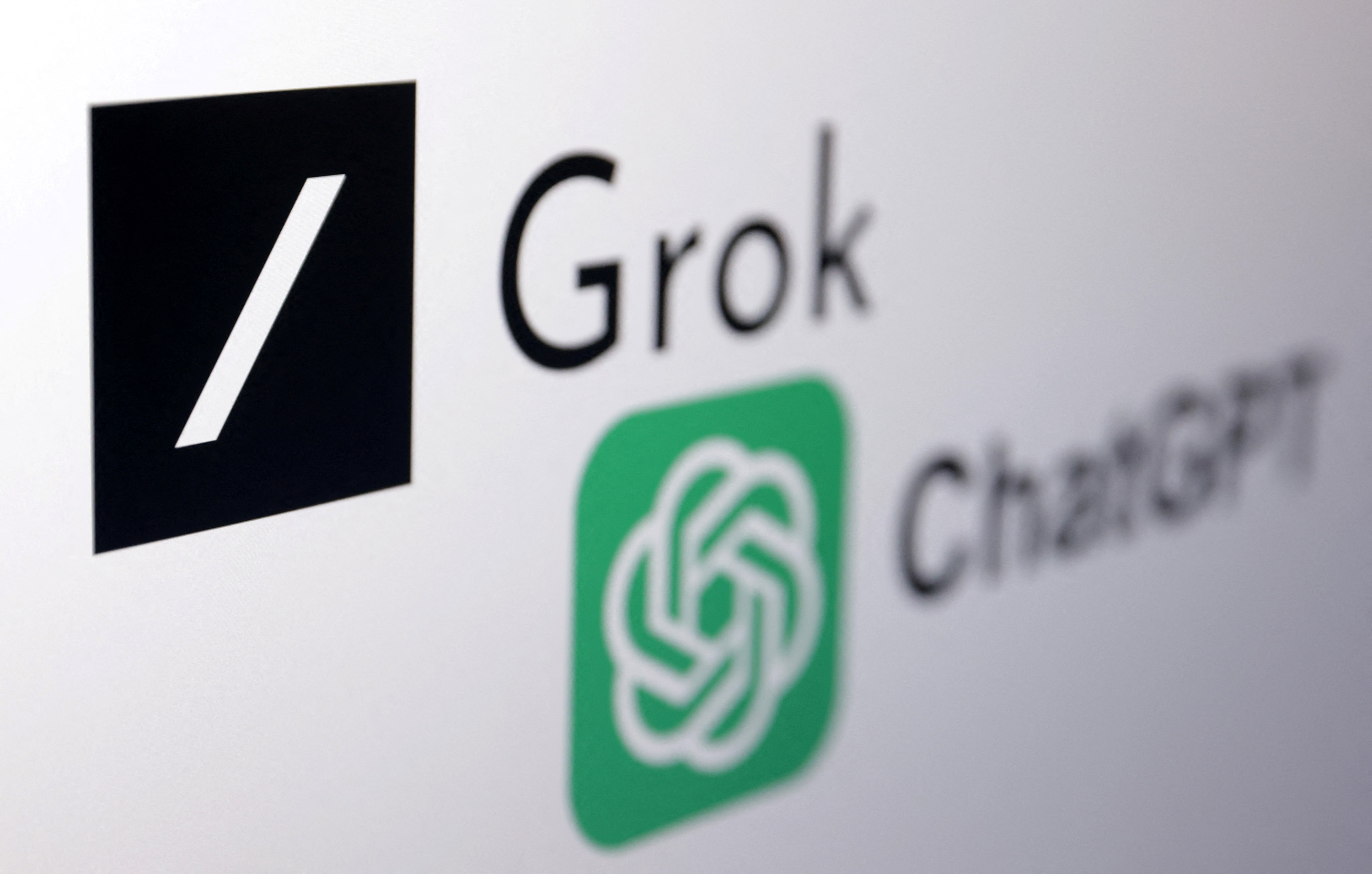 xAI Grok chatbot and ChatGPT logos are seen in this illustration taken, March 11, 2024. REUTERS/Dado Ruvic/Illustration