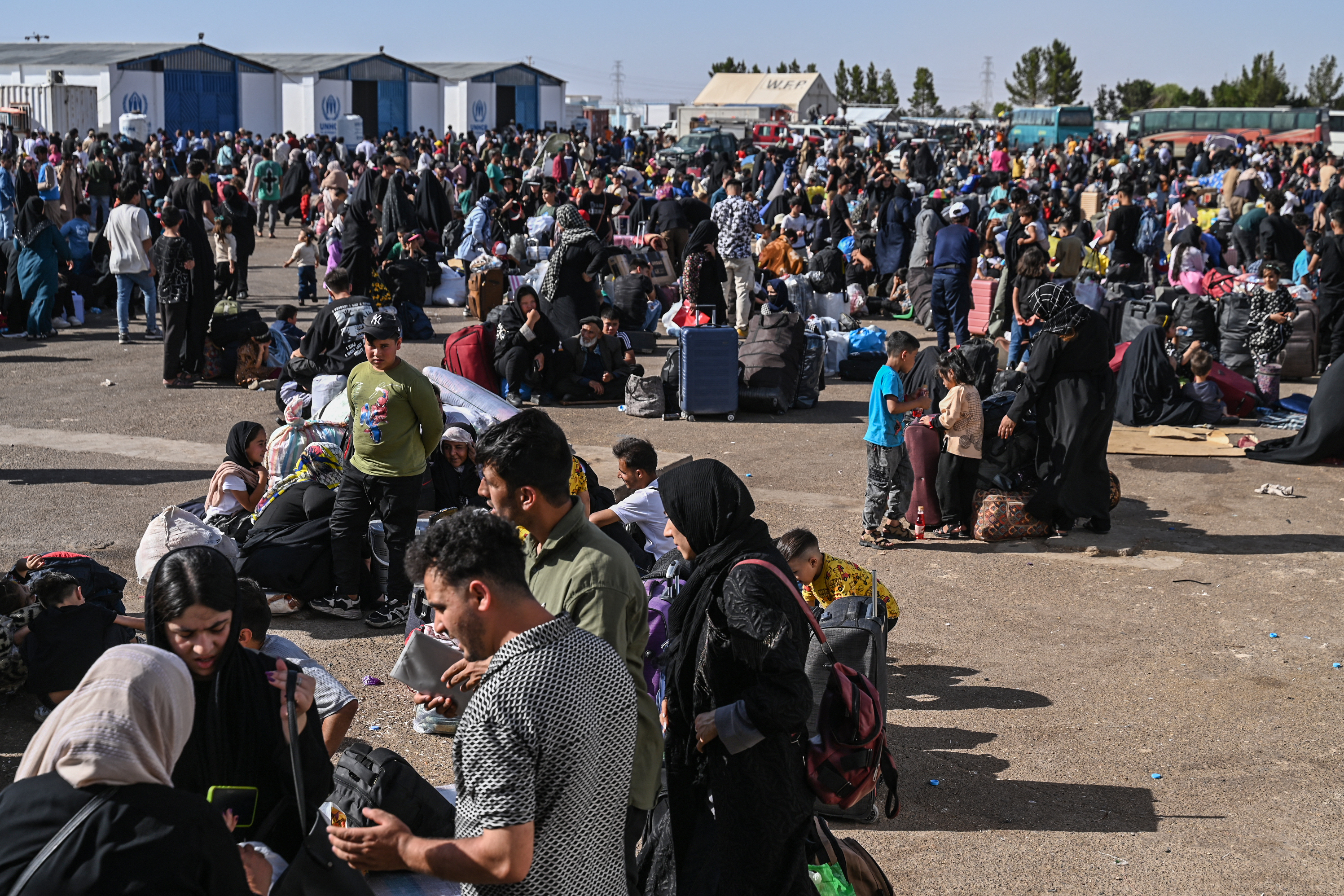 Afghan refugees arrive from Iran at Islam Qala border between Afghanistan and Iran