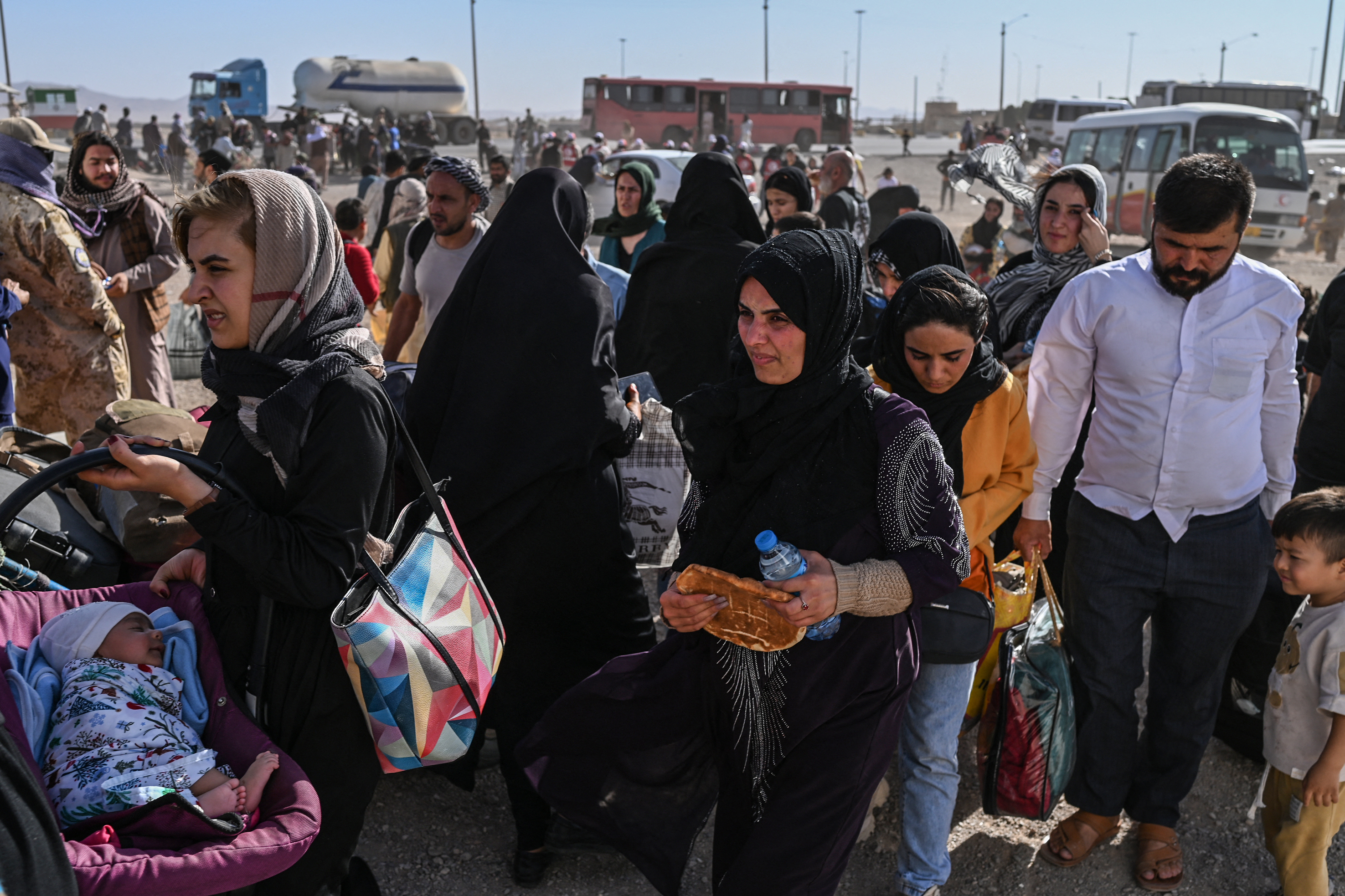 Afghan refugees arrive from Iran at Islam Qala border between Afghanistan and Iran