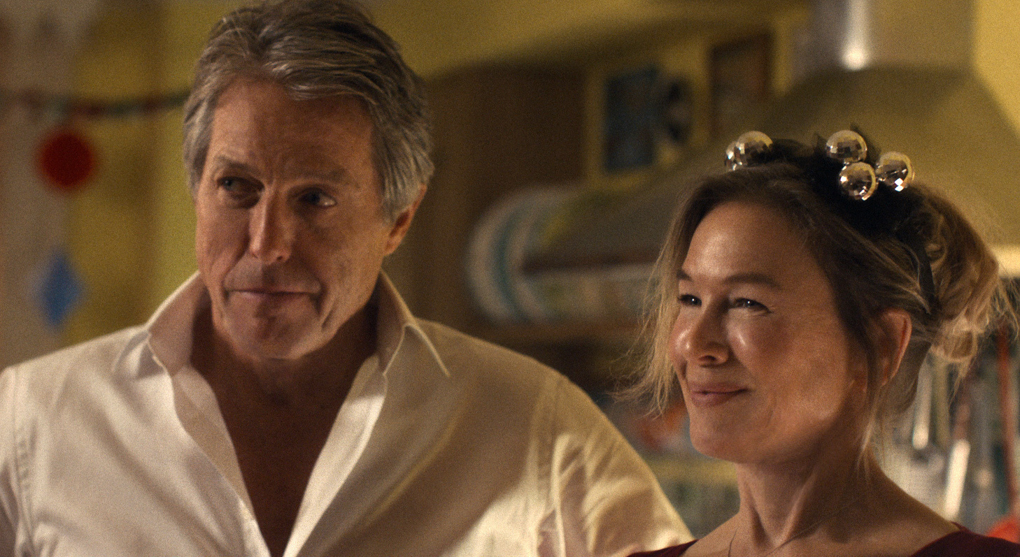 This image released by Universal Pictures shows Hugh Grant, left, and Renée Zellweger in a scene from "Bridget Jones: Mad About the Boy." 