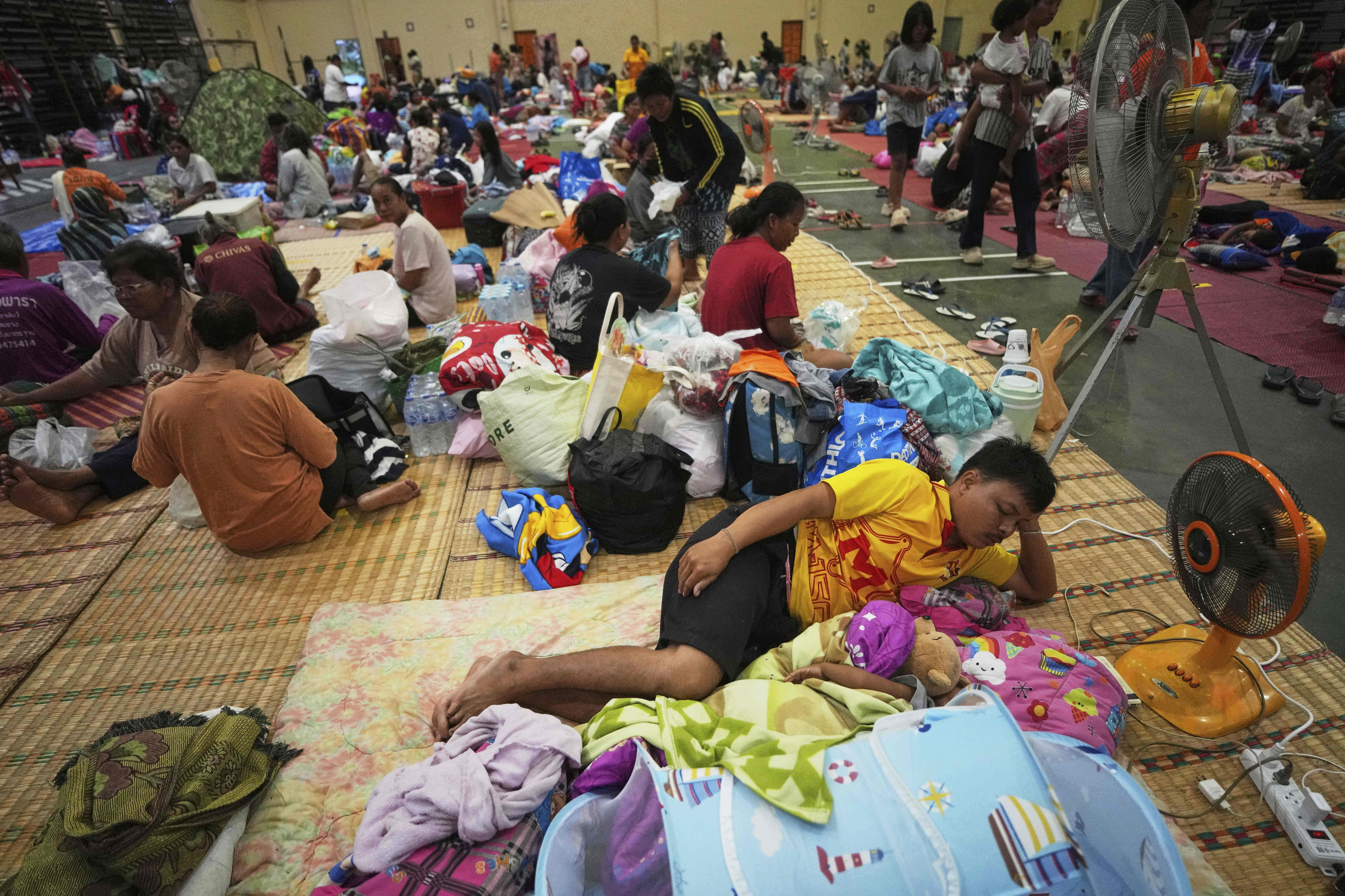Thai residents who fled their homes rest at an evacuation centre in Surin province, Thailand, on July 25, 2025