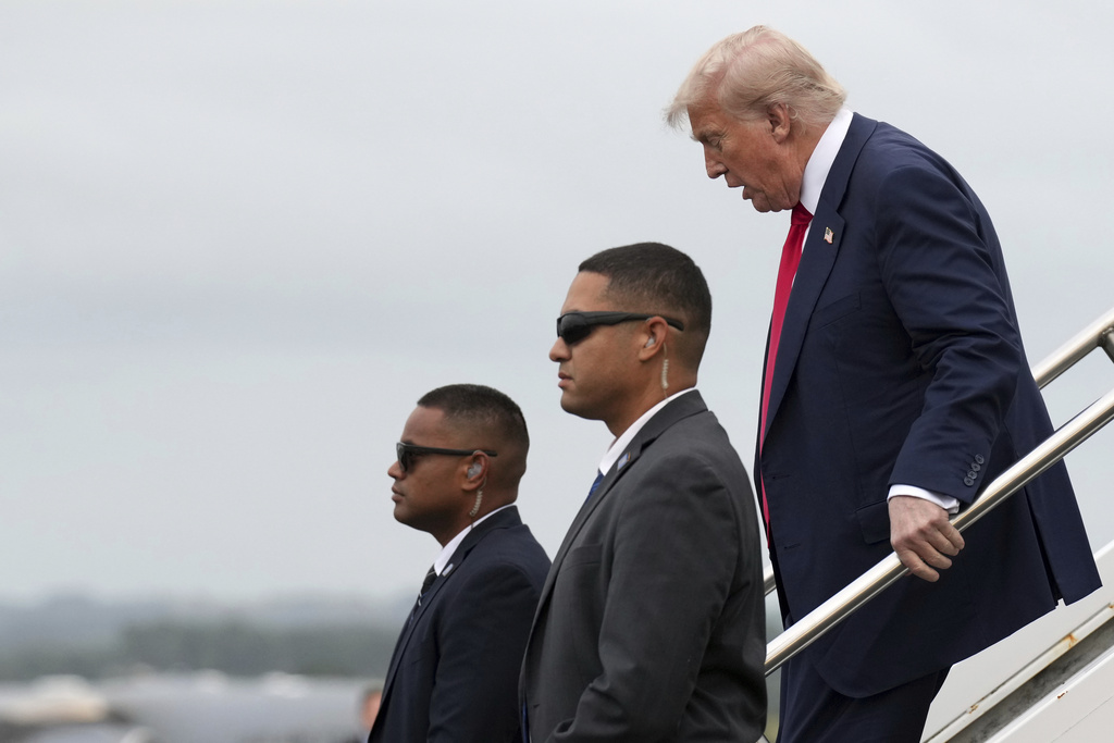 Trump coming down jet stairs